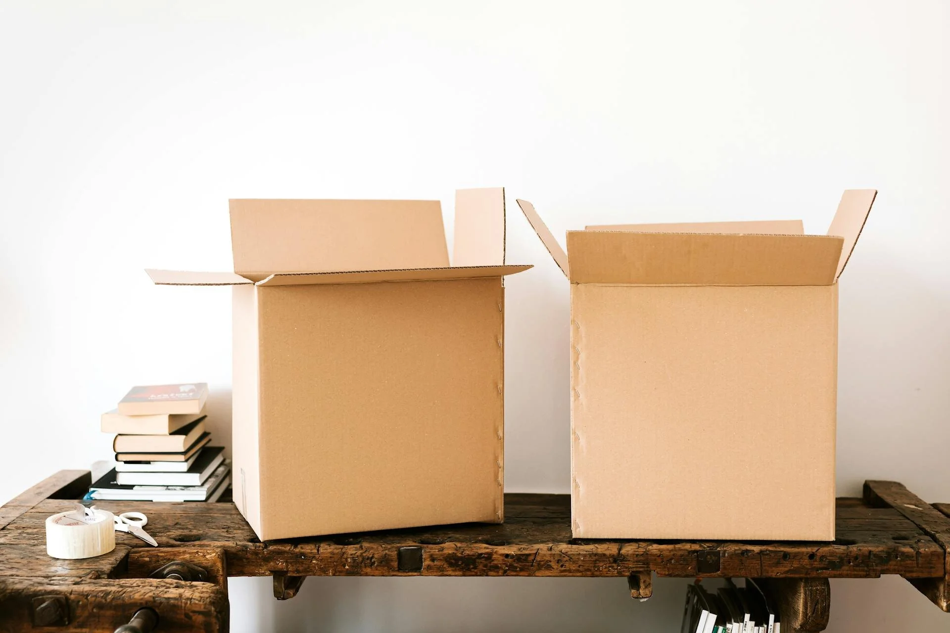 cardboard boxes on wooden table