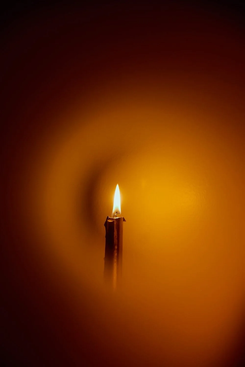 Candle in orange light