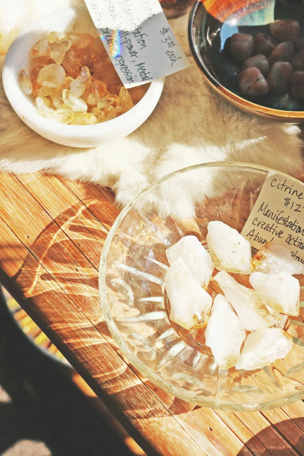 Crystals in bowl at shop  by Madison Inouye