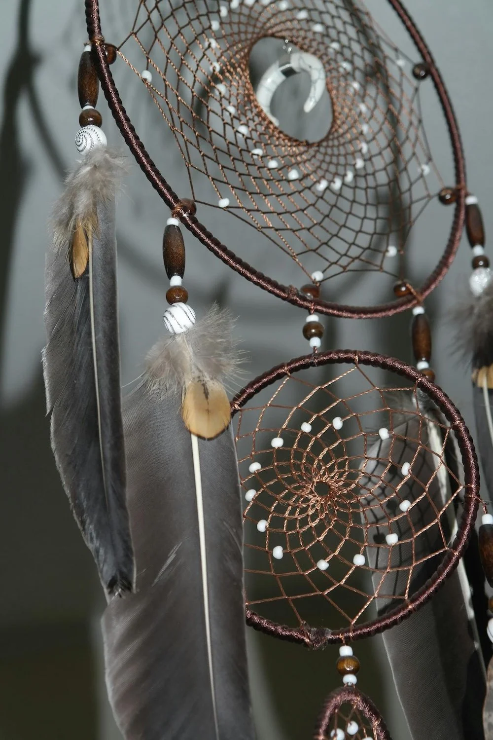 Photo of a brown dream catcher by Sarah Bailey on Pexels
