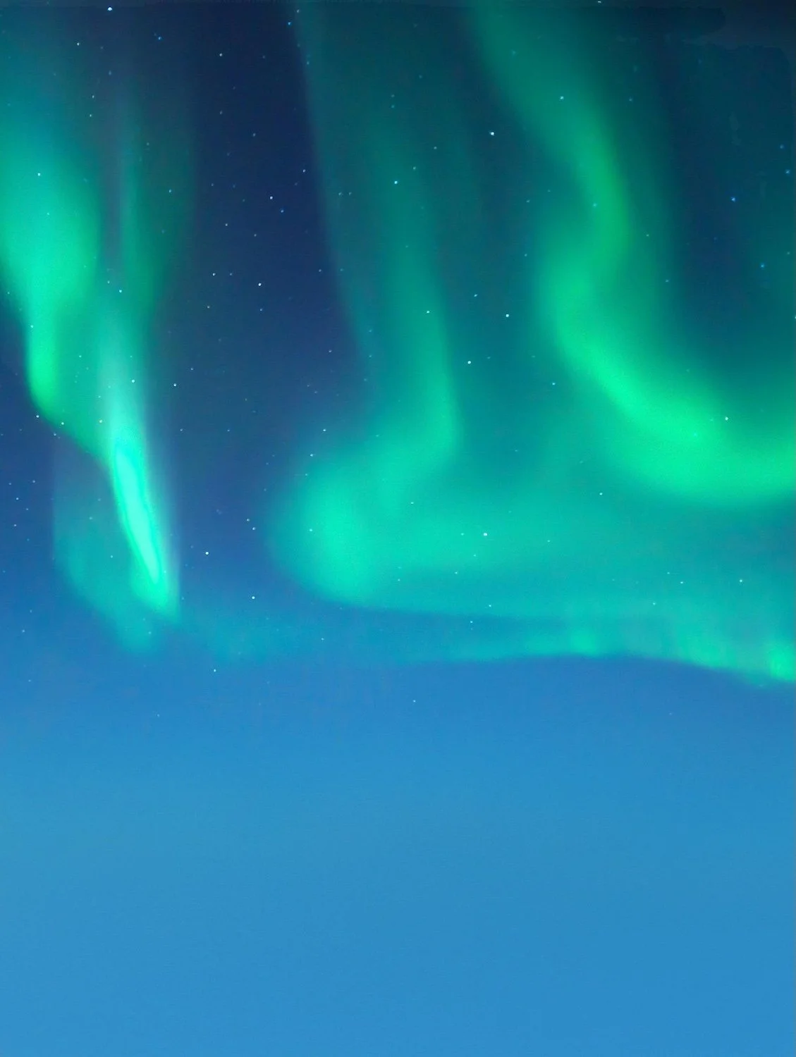 Photo of green northern lights with blue sky by Manish Meena❤ on Pexels