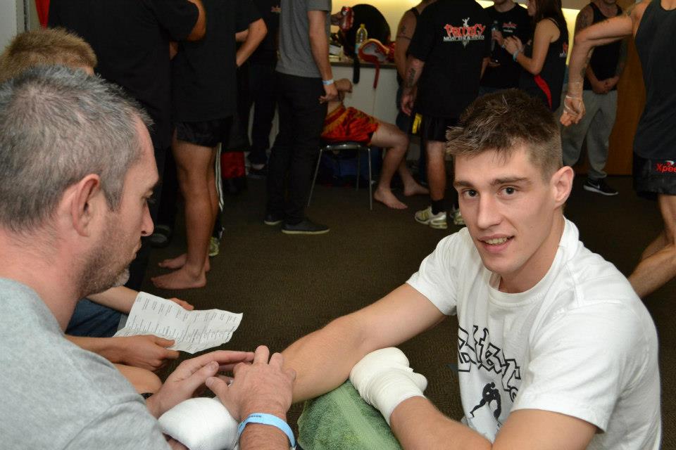 Richie Elliott wrapping Hands for Dylan 