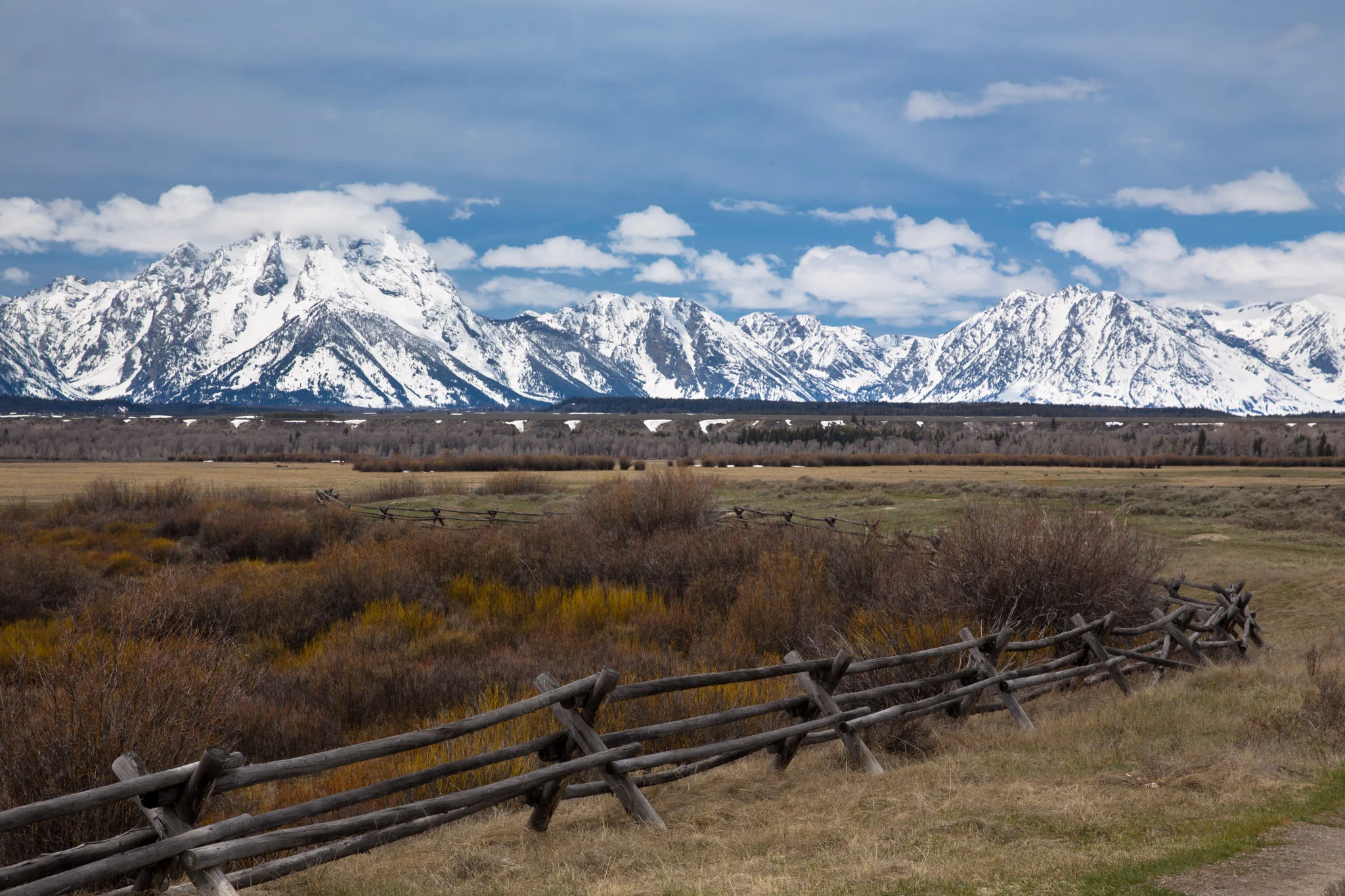 This fence runs next to an old, two room log cabin. The early settlers encountered some very trying situations but they did get rewarded with morning views like these.