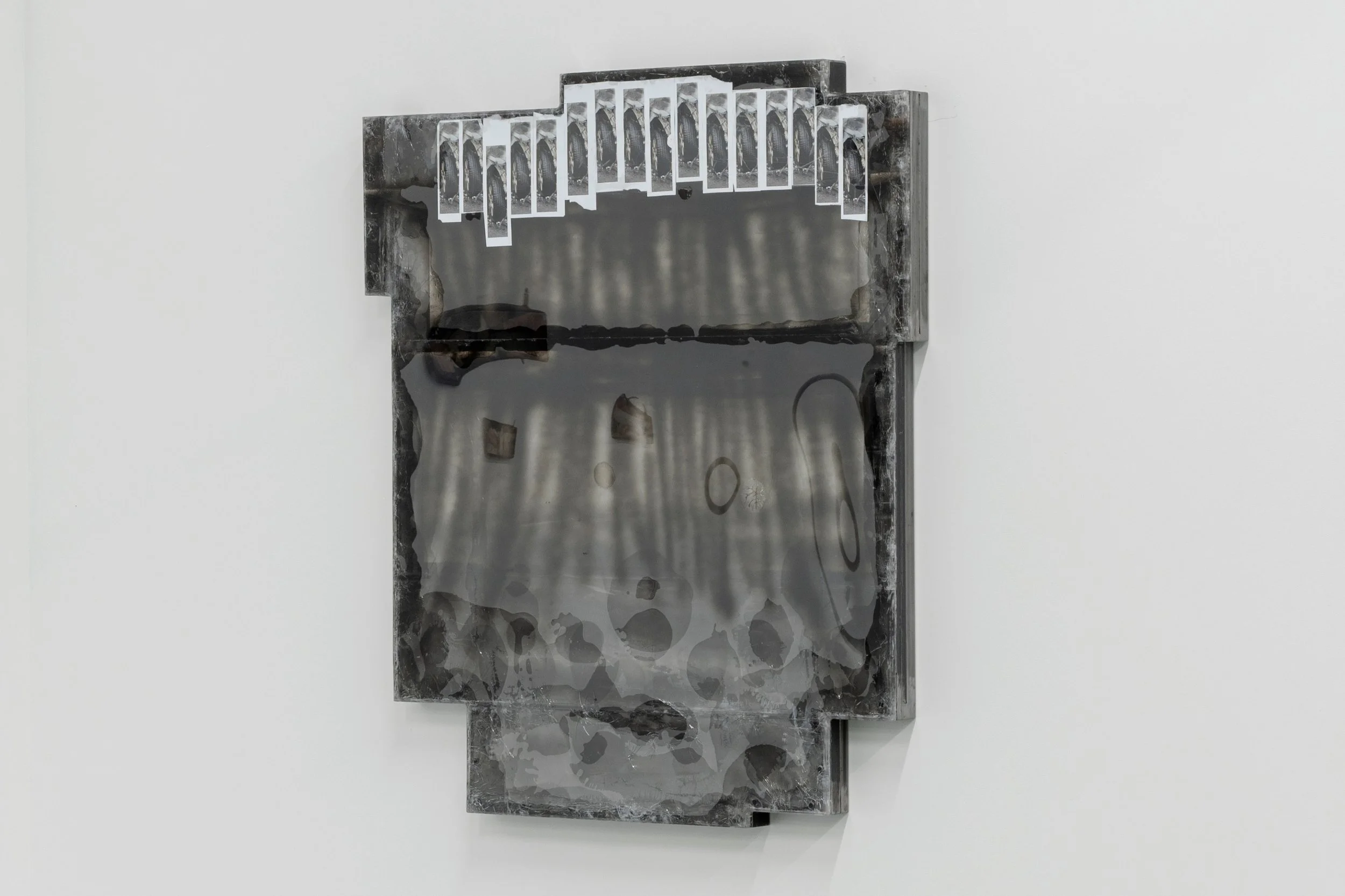  JASON GRINGLER.  PHOTO JOURNAL (15) (2025).  ‘SHADWELL BIENNIAL’ SEASON 4 EPISODE 6, SANTI GALLERY, LONDON. JAN 22 - FEB 14 2026.  LAYERED ACRYLIC GLASS, REFLECTIVE VINYL, PHOTOGRAPHS, WOOD, ADHESIVES, STEEL, SPRAY ENAMEL, COLLAGE, PACKING TAPE.  11