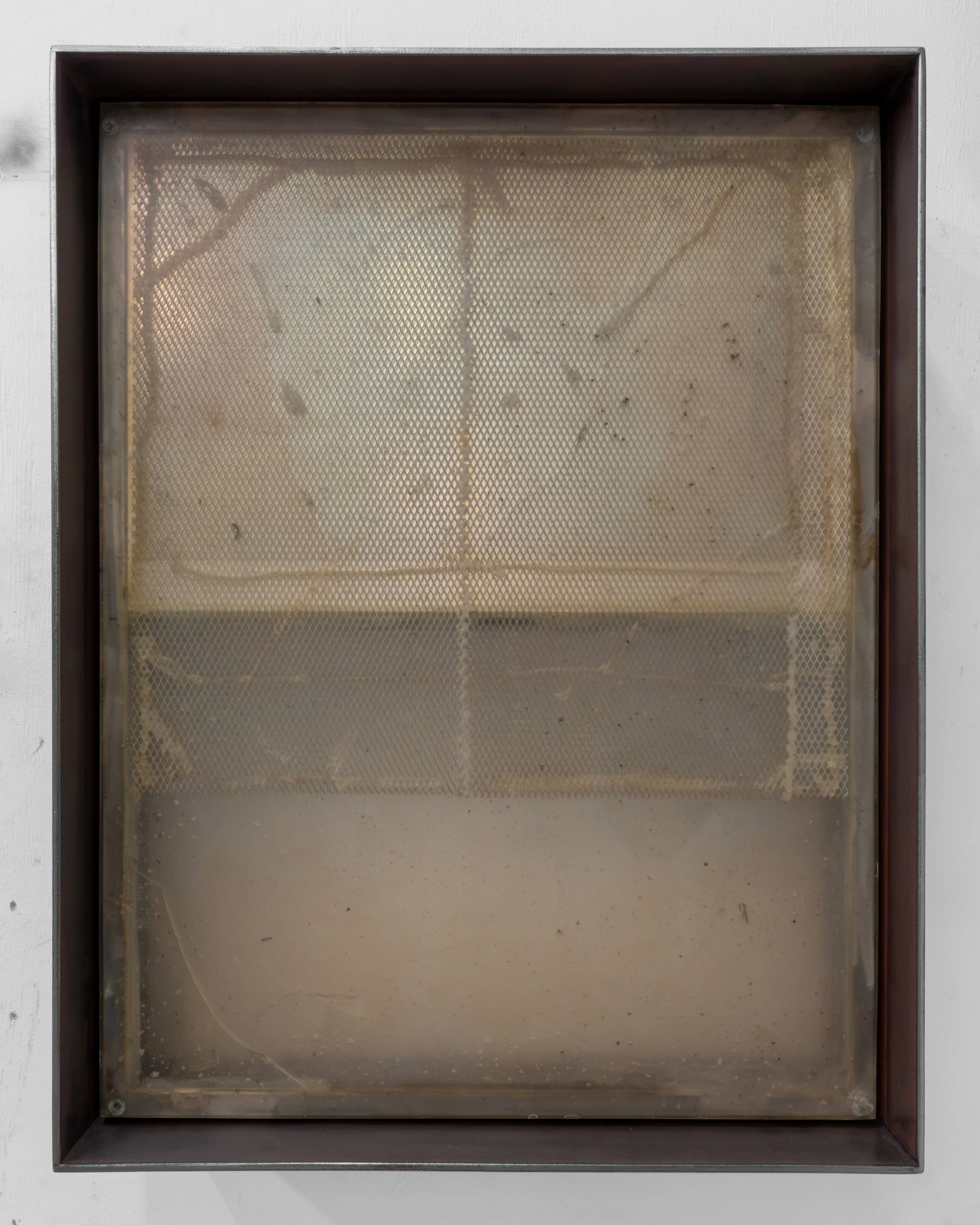  JASON GRINGLER.   (DEFACED) MONOCHROME (15) (2018-2026).  STUDIO VIEW.  STEEL, MIRRORED GLASS, GLASS, EXPANDED ALUMINUM, PIGMENT, HARDWARE, EPOXY, RUST, WAX, ADHESIVES.  20 X 60.5 X 78.5 CM. 