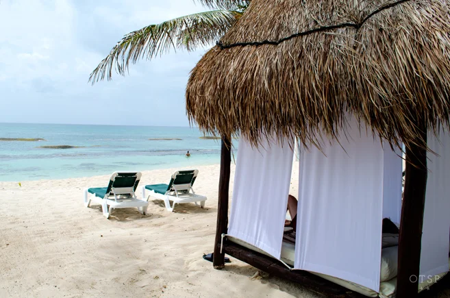 Private beachfront *palapas*