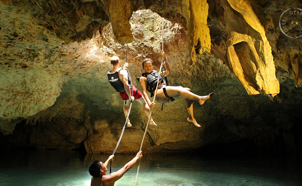 Rapelling down into Nohoch Nah Chich - Tulum, Mexico