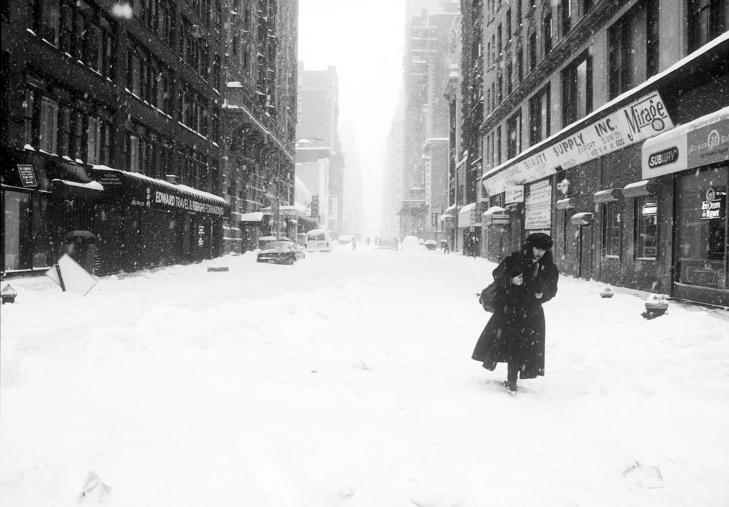 woman walks in snowrev213.5.jpg