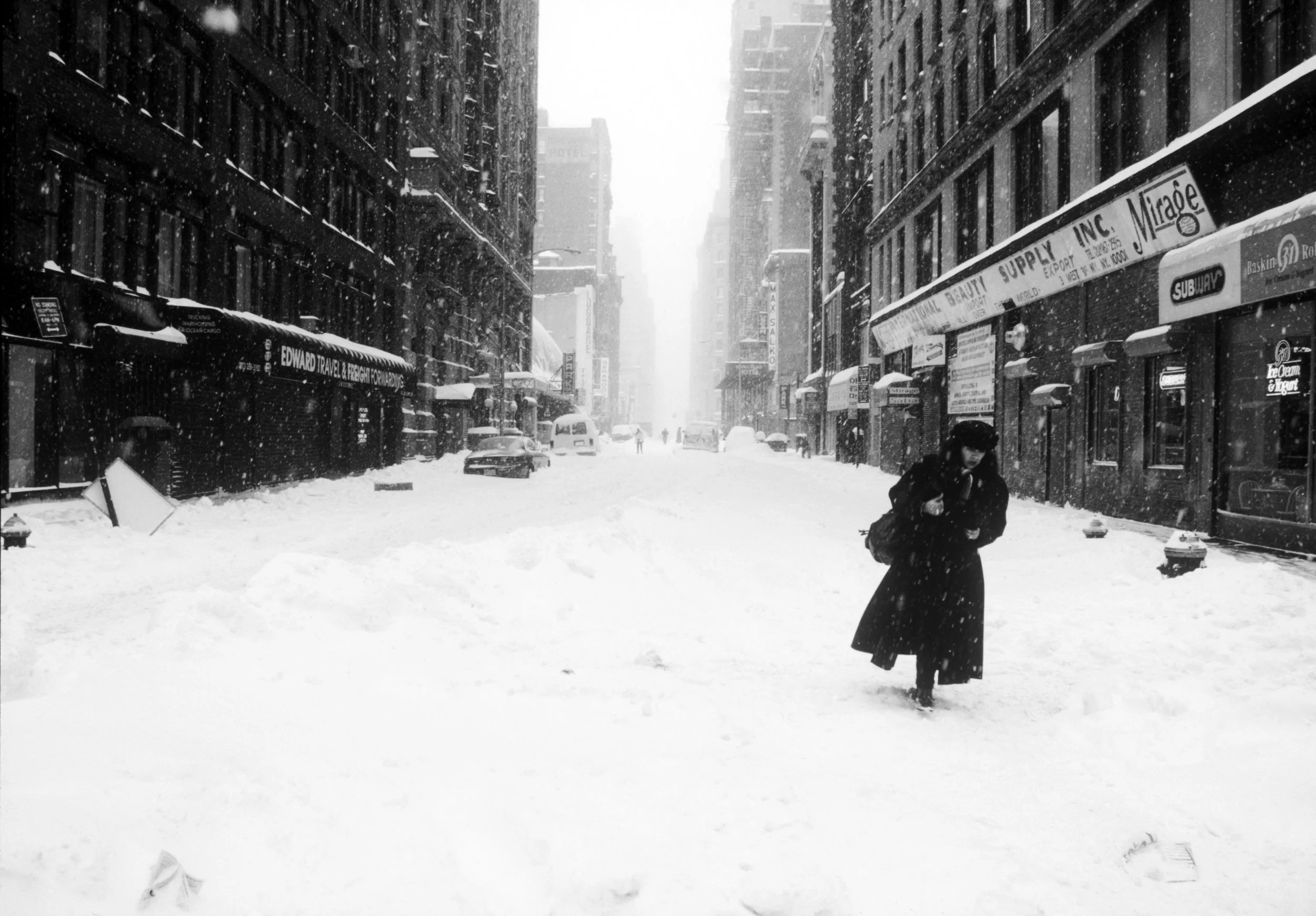 woman walks in snowrev2.jpg