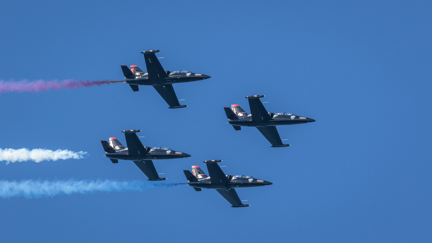 Patriots flight team in delta formation.jpg