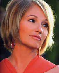 Ellen Birkin wearing JAR earrings