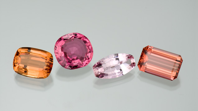 This selection of gems from Ouro Prêto, Brazil, and Russia's Ural Mountains, displays the golden orange to pinkish red color range of precious topaz. The gems range from 7.61 to 14.33 carats in size.