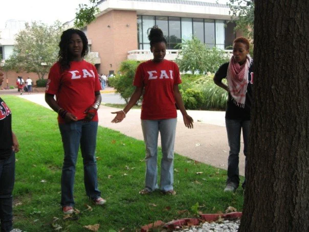 with my sorority sisters singing around our tree <3 @}--