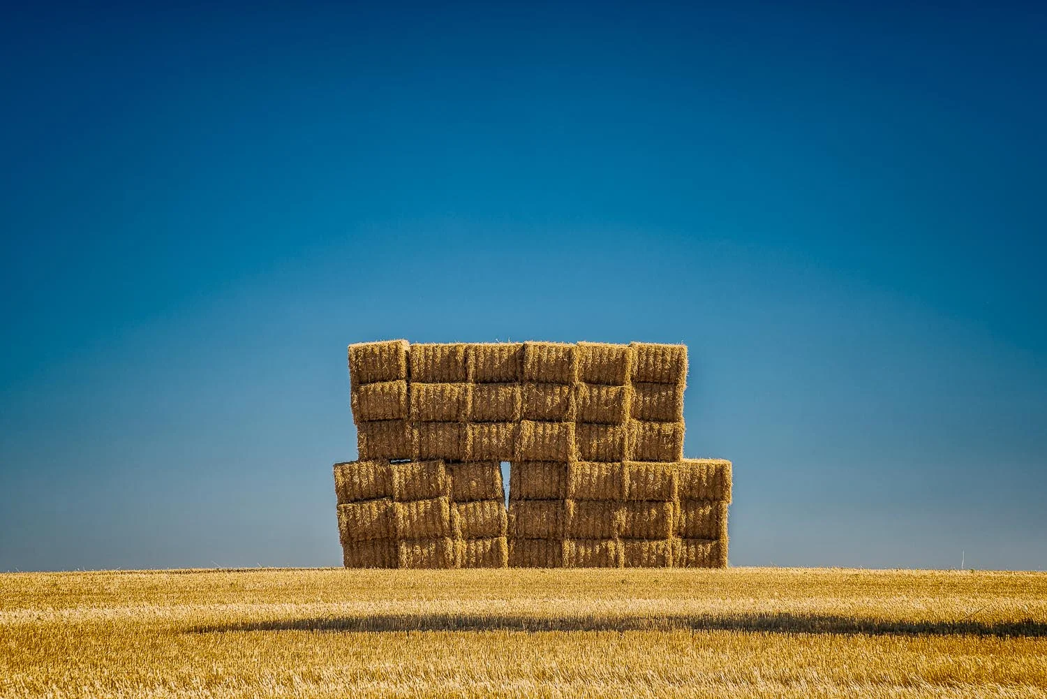 Move forward with your photos through composition. Hay Bales in Byaduk, Australia.