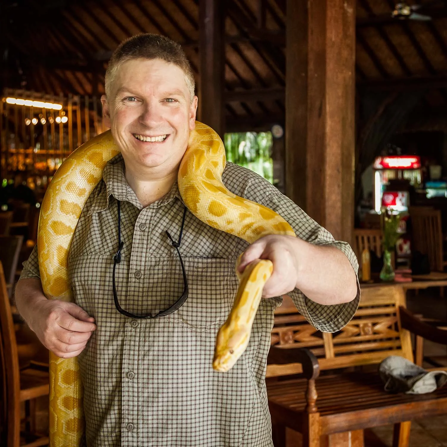 Glenn Guy, the Travel Photography Guru, and python at a zoo in beautiful Bali, Indonesia.