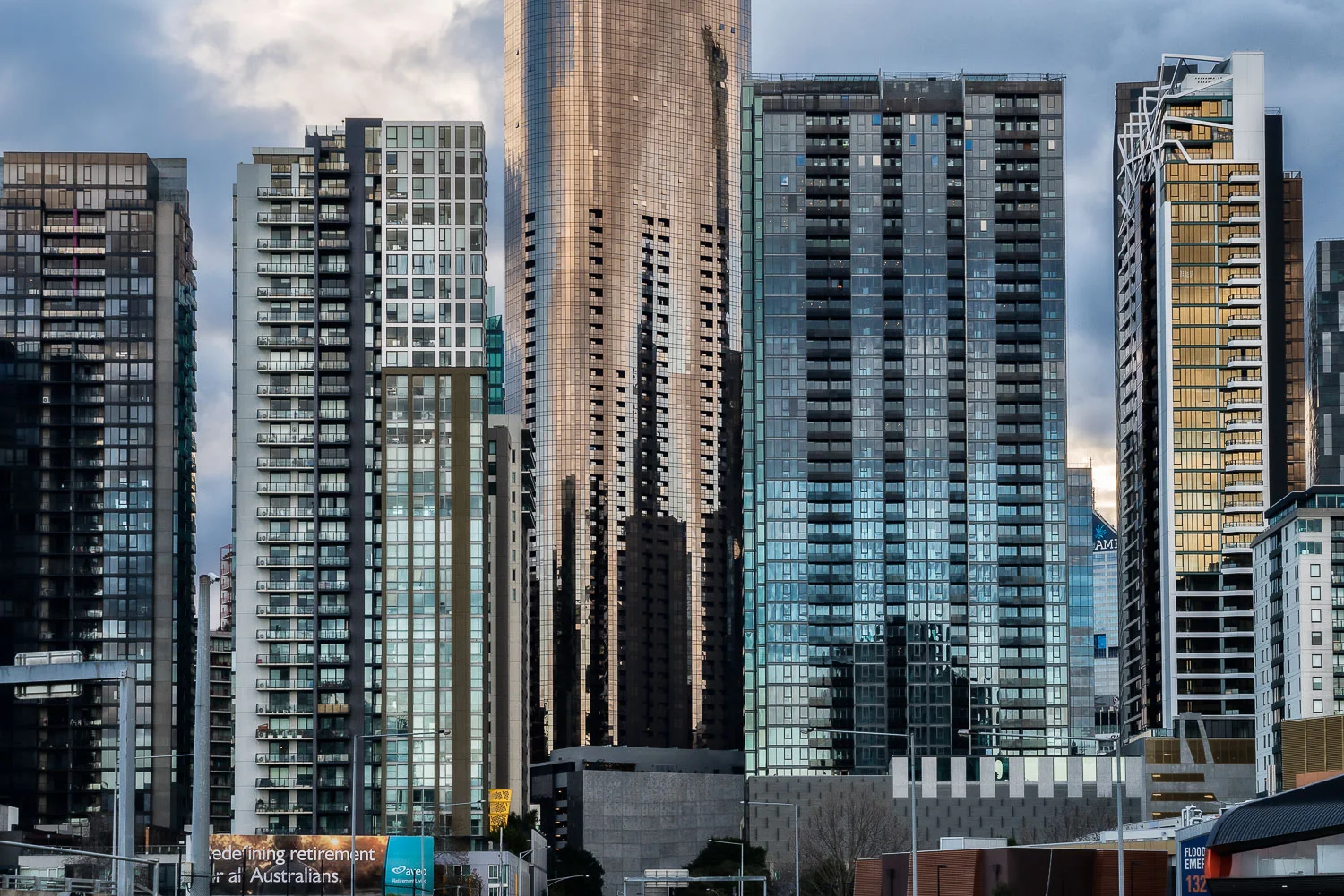 The glow of the golden hour illuminates these skyscrapers in Lorimer Street on the edge of the Docklands precinct, Melbourne .