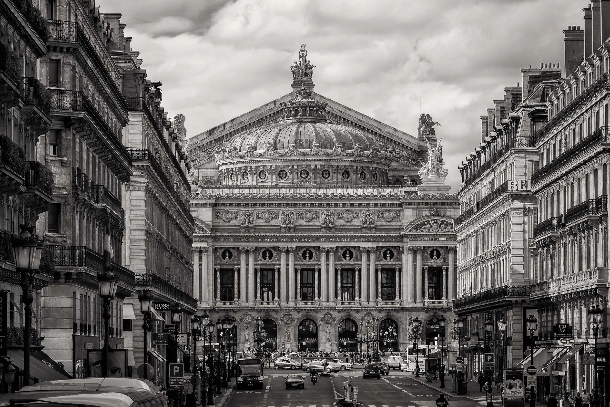 A contemporary black and white rendering of a Paris street scene , looking onto the Academie Nationale De Musique , evokes a sense of nostalgia in one of the world's most beautiful cities.