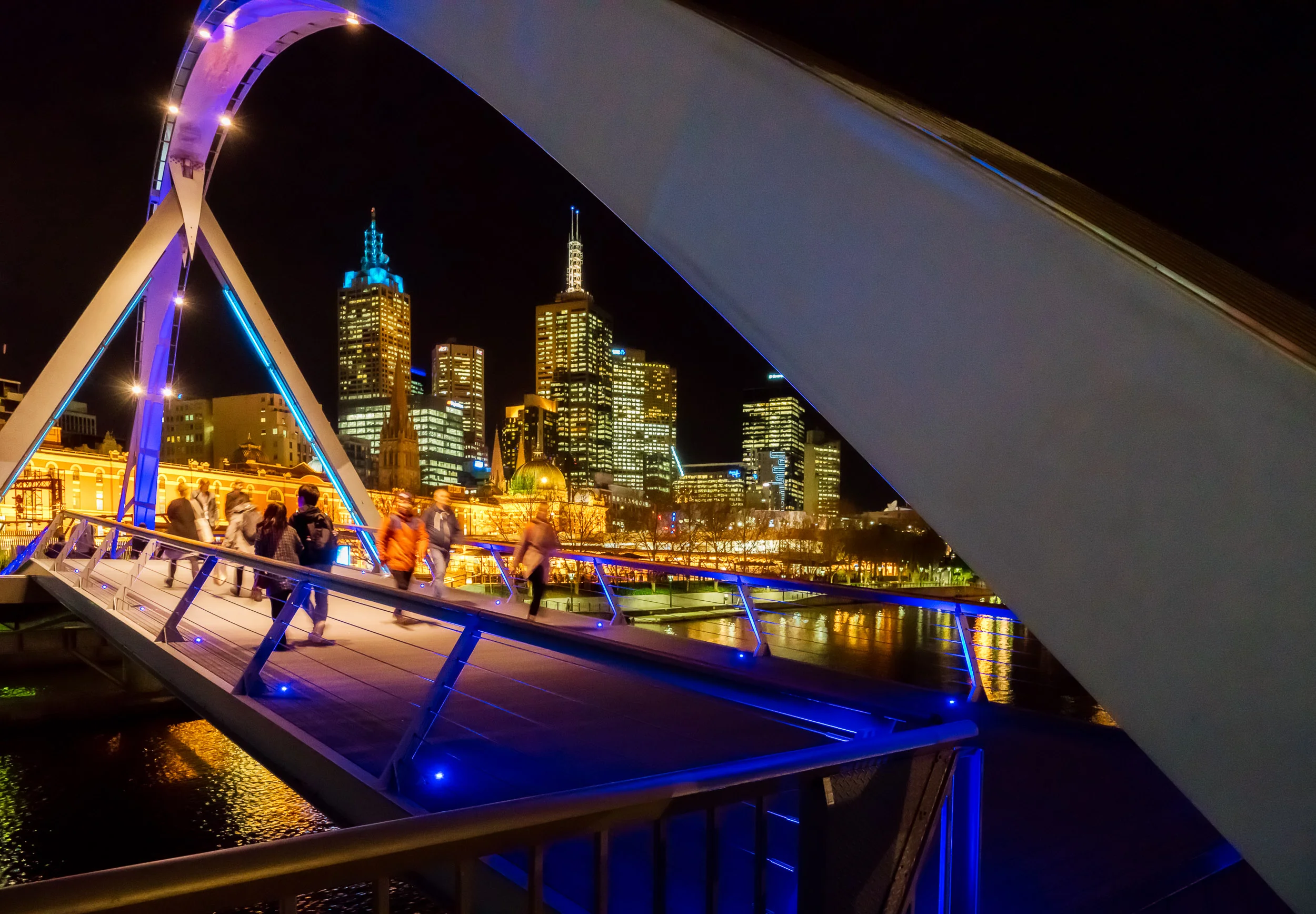 High iso image of a pedestrian bridge, on a winter’s evening, in Melbourne.