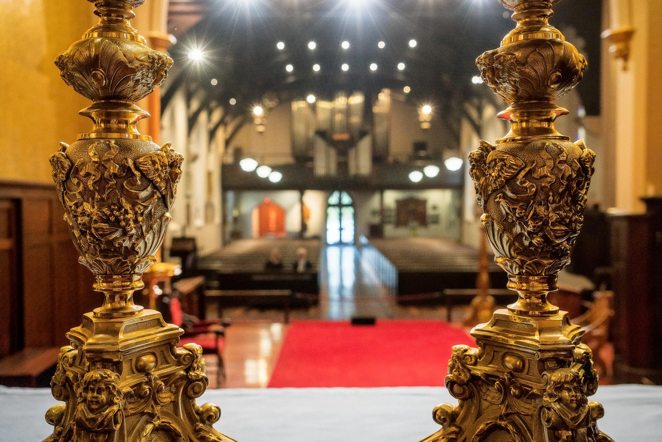 Detail of two candelabrum on the altar of St. Peter's Eastern Hill Anglican Church in East Melbourne, Australia .