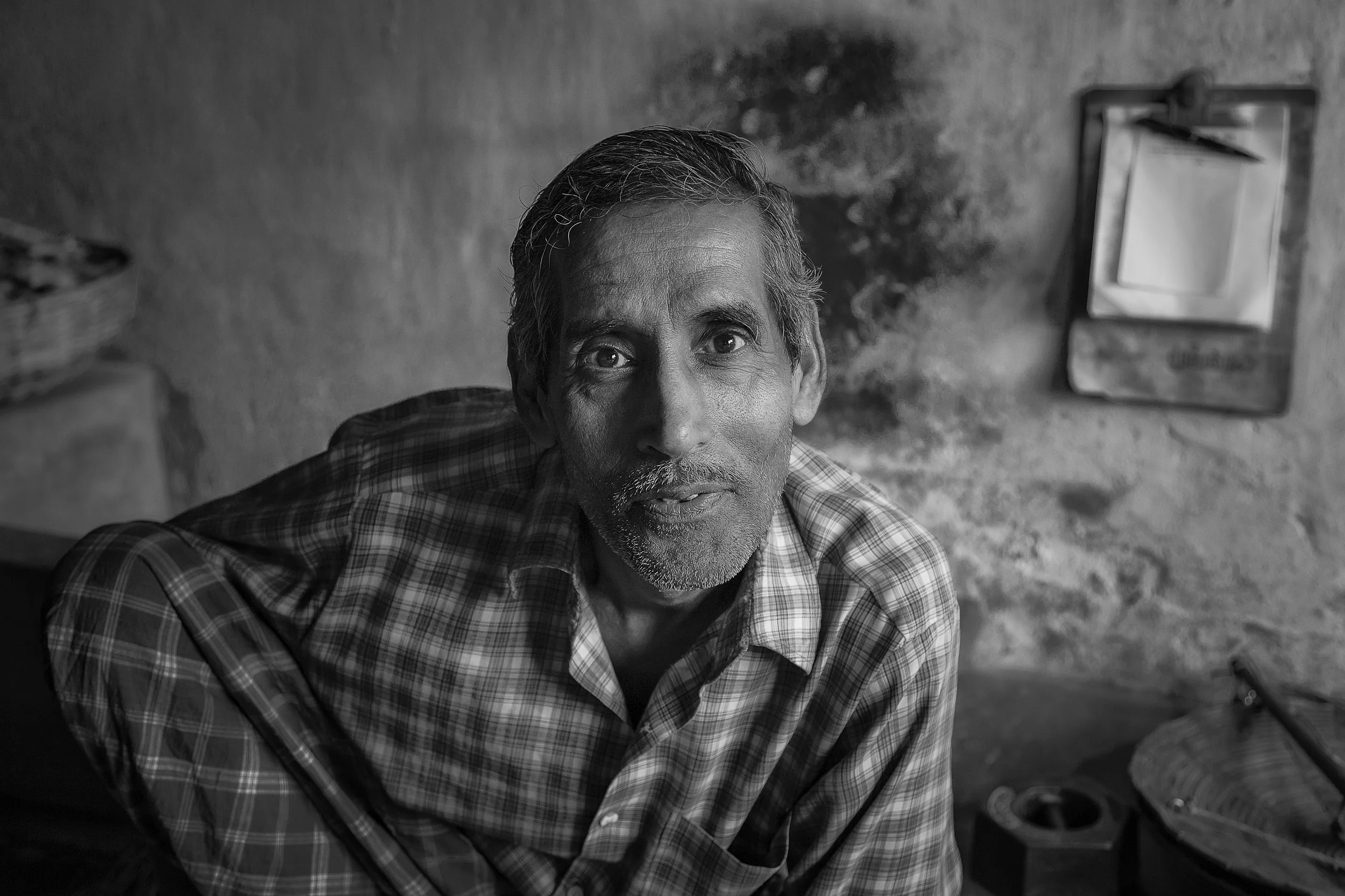 Portrait of a man in a local market in Kolkata, India.