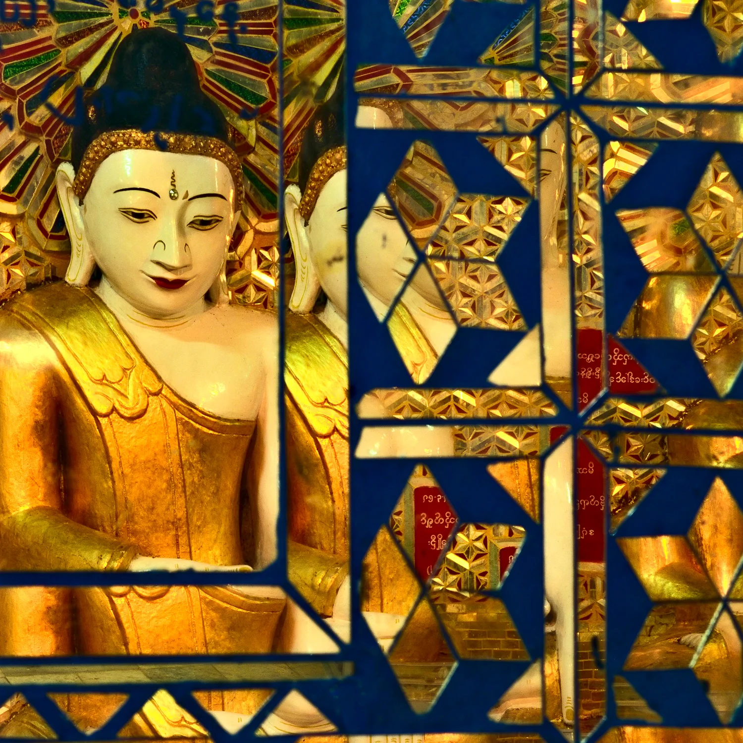 Reflections of a beautiful Buddha statue on Saiging Hill , Myanmar .