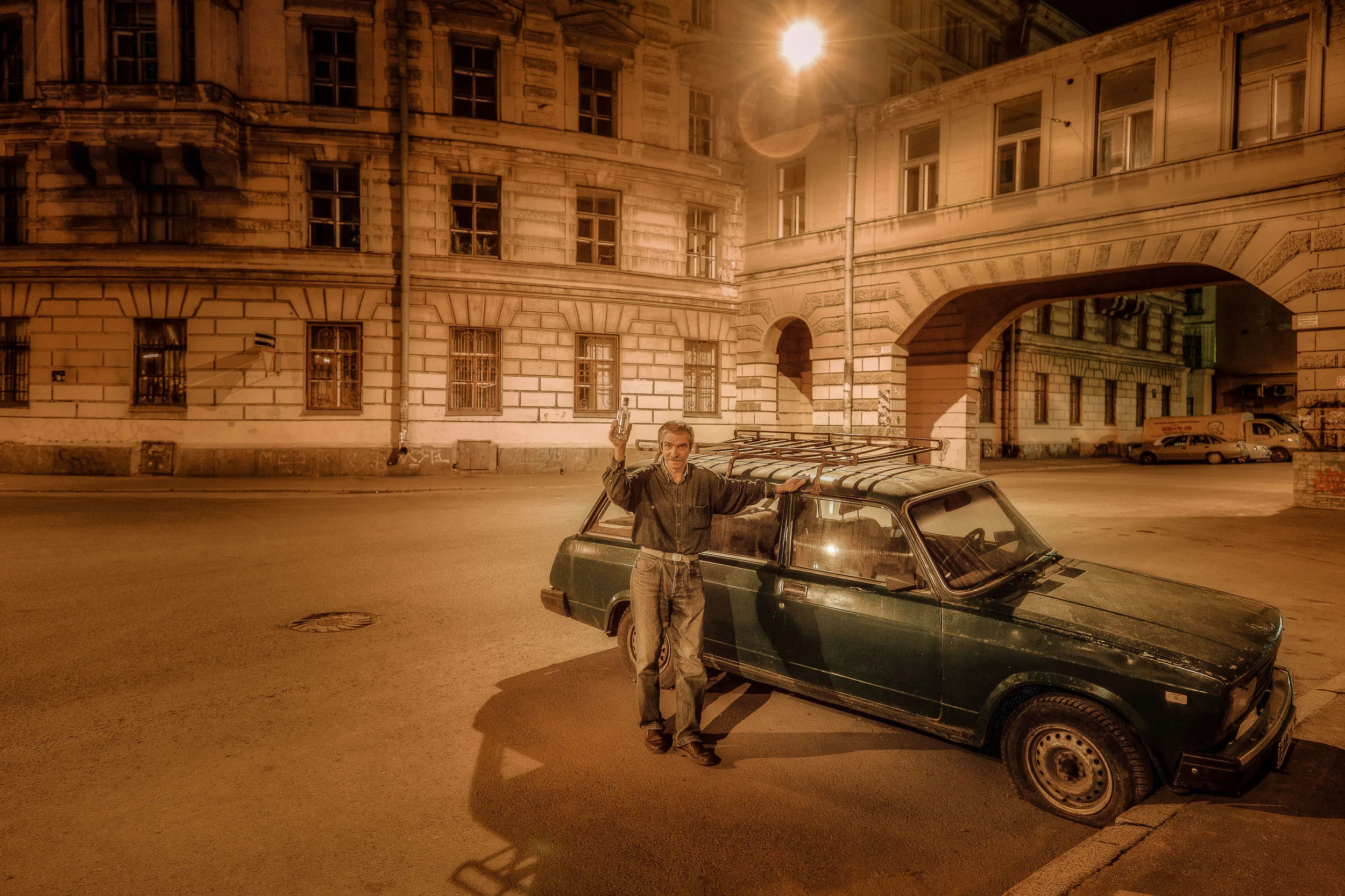 Friendly man and Lada car, Russian Navy Day in St. Petersburg, Russia.