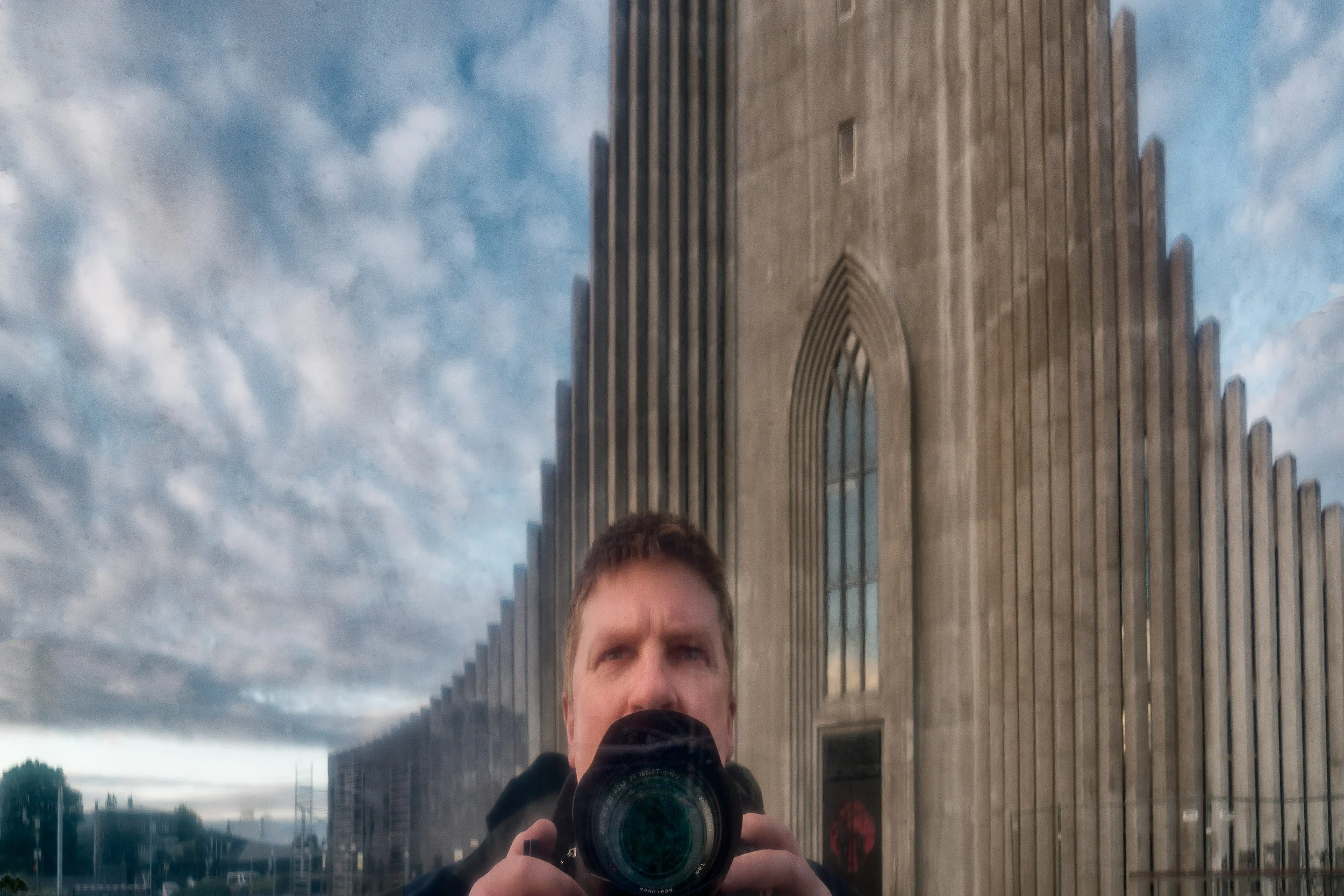 A self portrait of Glenn Guy, the Travel Photography Guru , outside Hallgrimskirkja Luthern church in Reykjavík, Iceland .