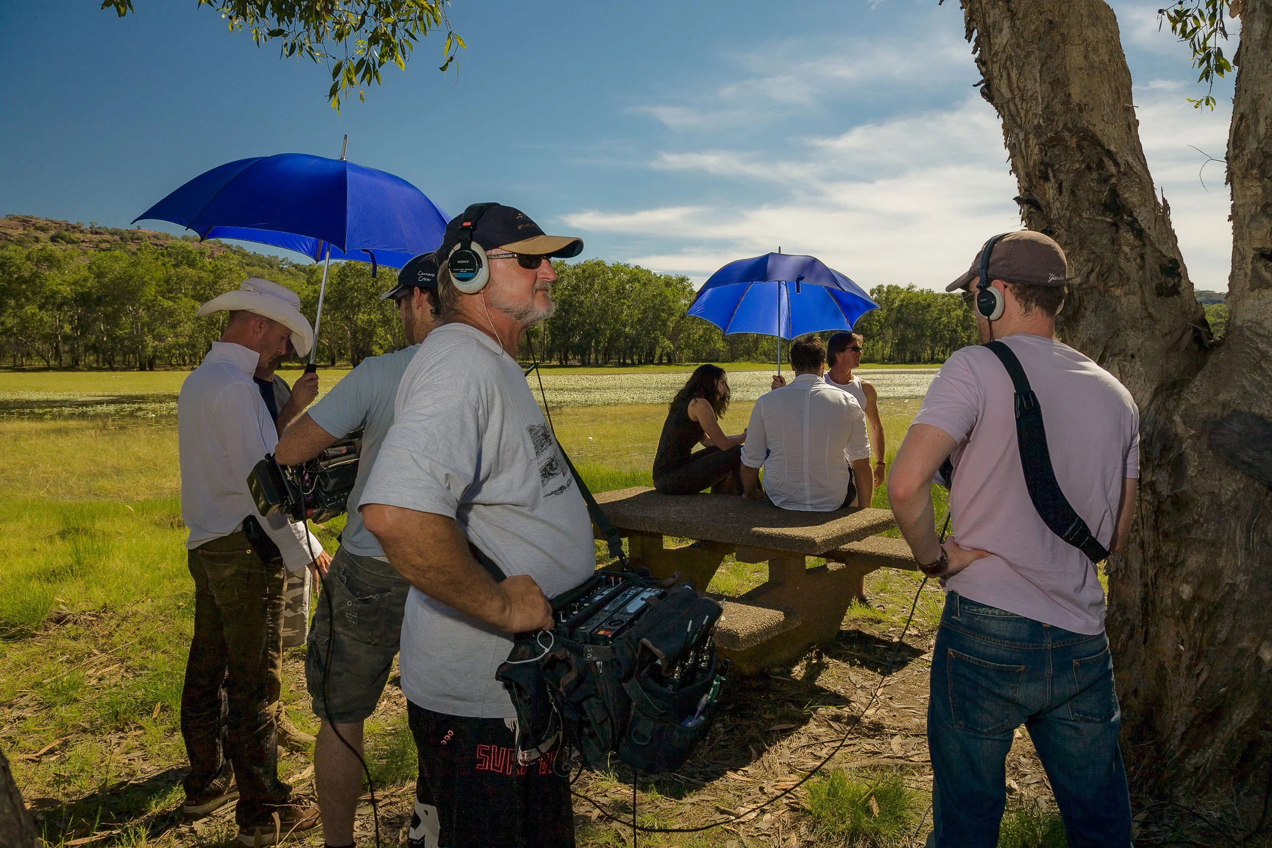 Behind the scenes view of a film crew at the Abangbang Billabong in Kakadu National Park, Australia .