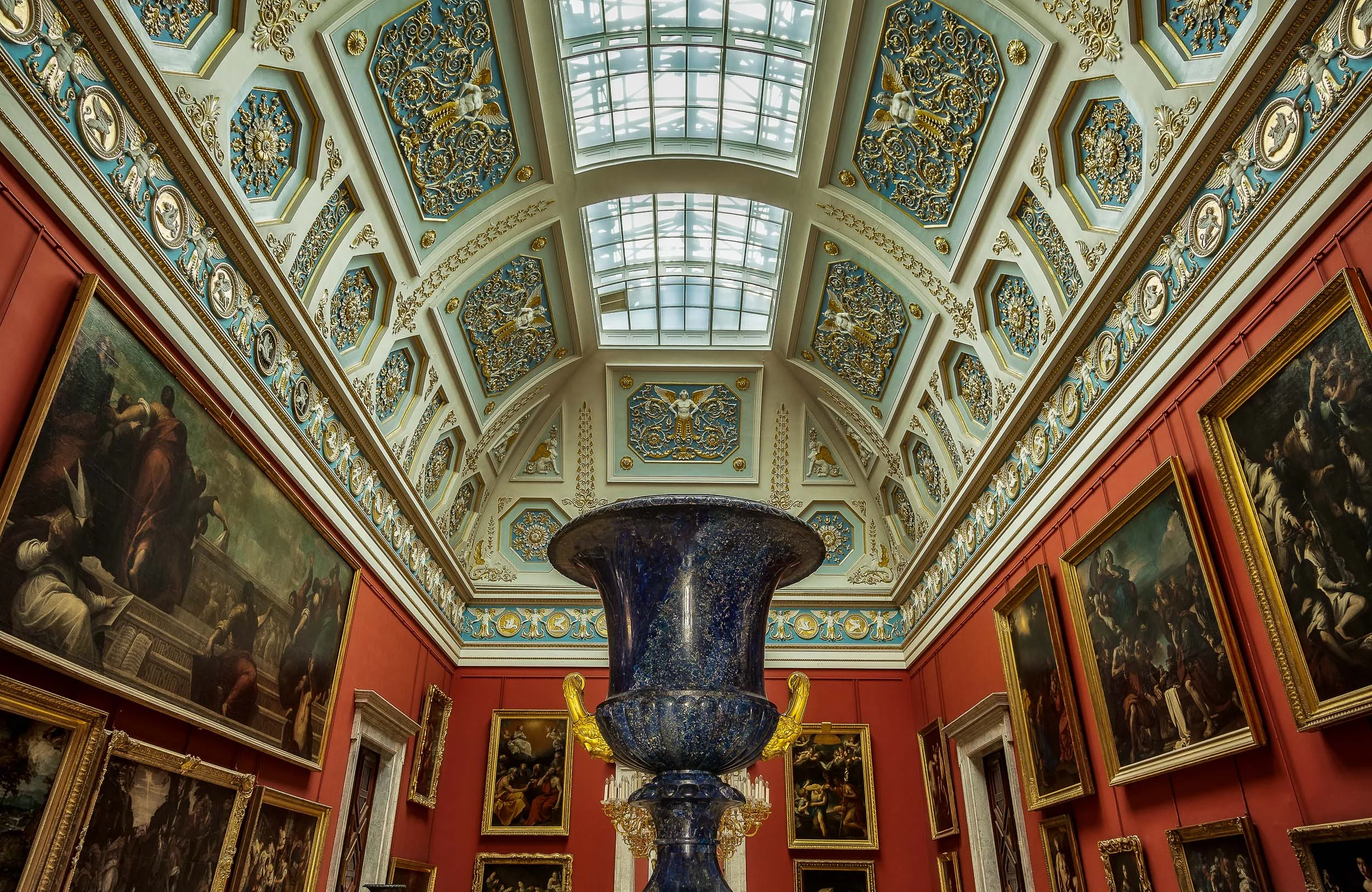 A highly structured interior view of a gallery within the Hermitage Museum in St. Petersburg, Russia .