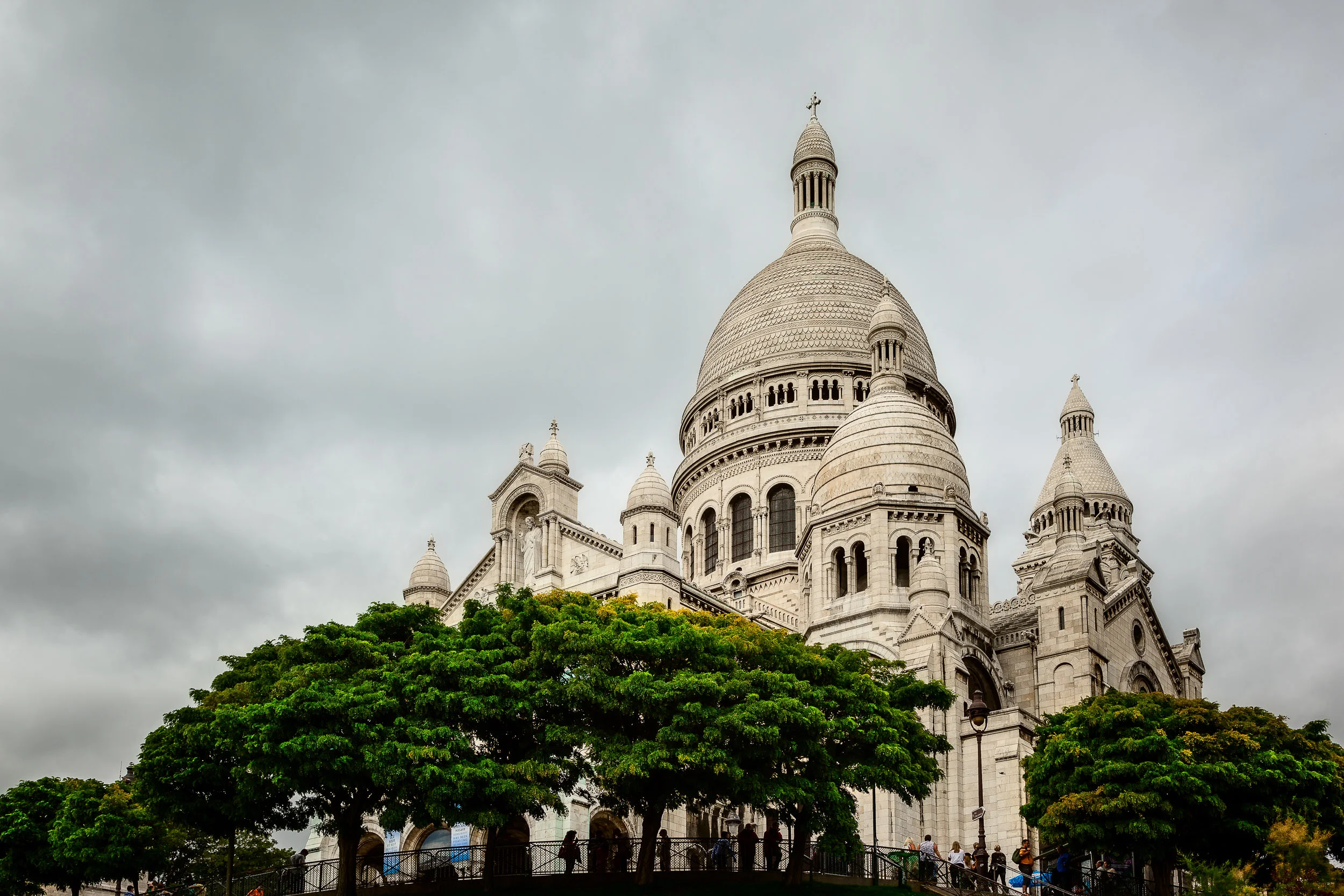 An upward view of the beautiful Sacre Coeur Basilica in Montmarte in Paris, France .