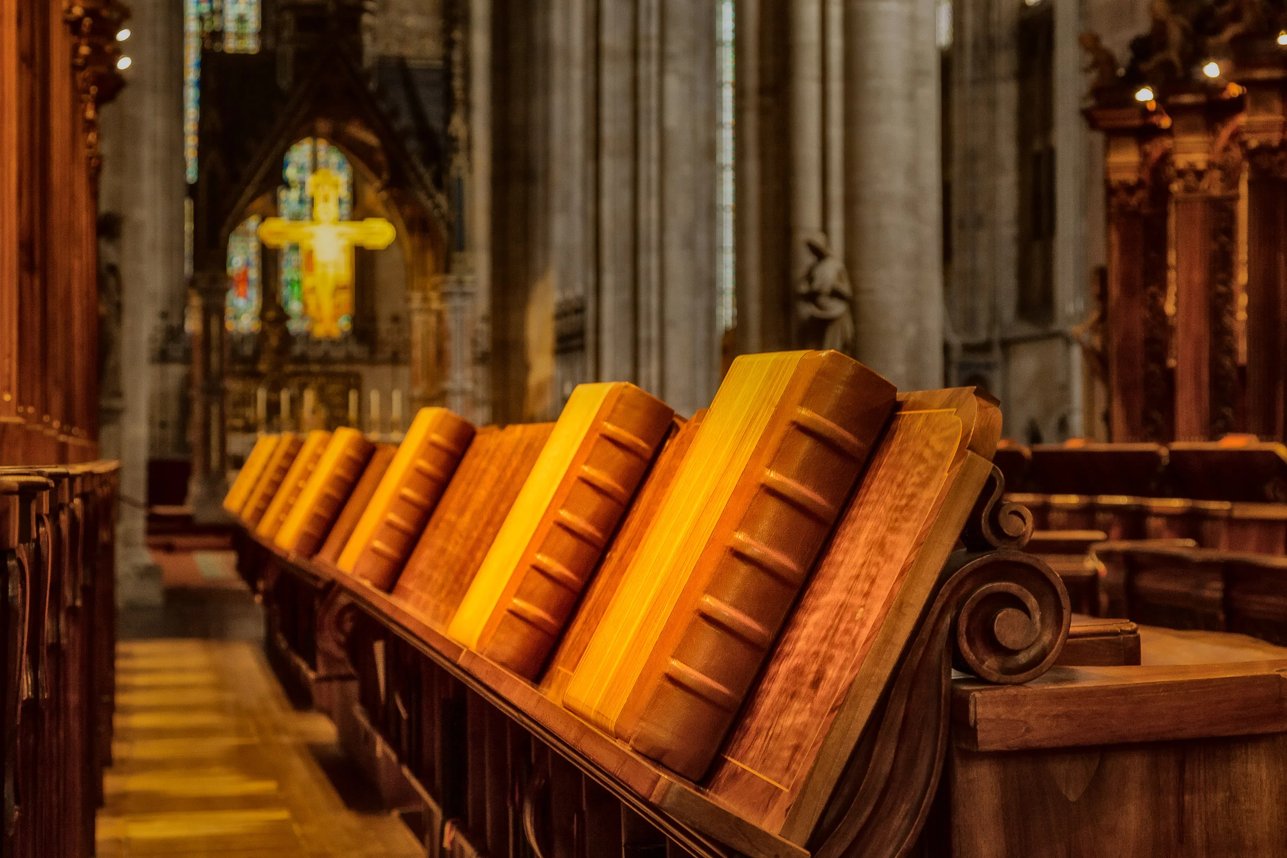 The warmth of wood and leather greets visitors to this lovely chapel at Helligenkreuz Abbey in Austria .