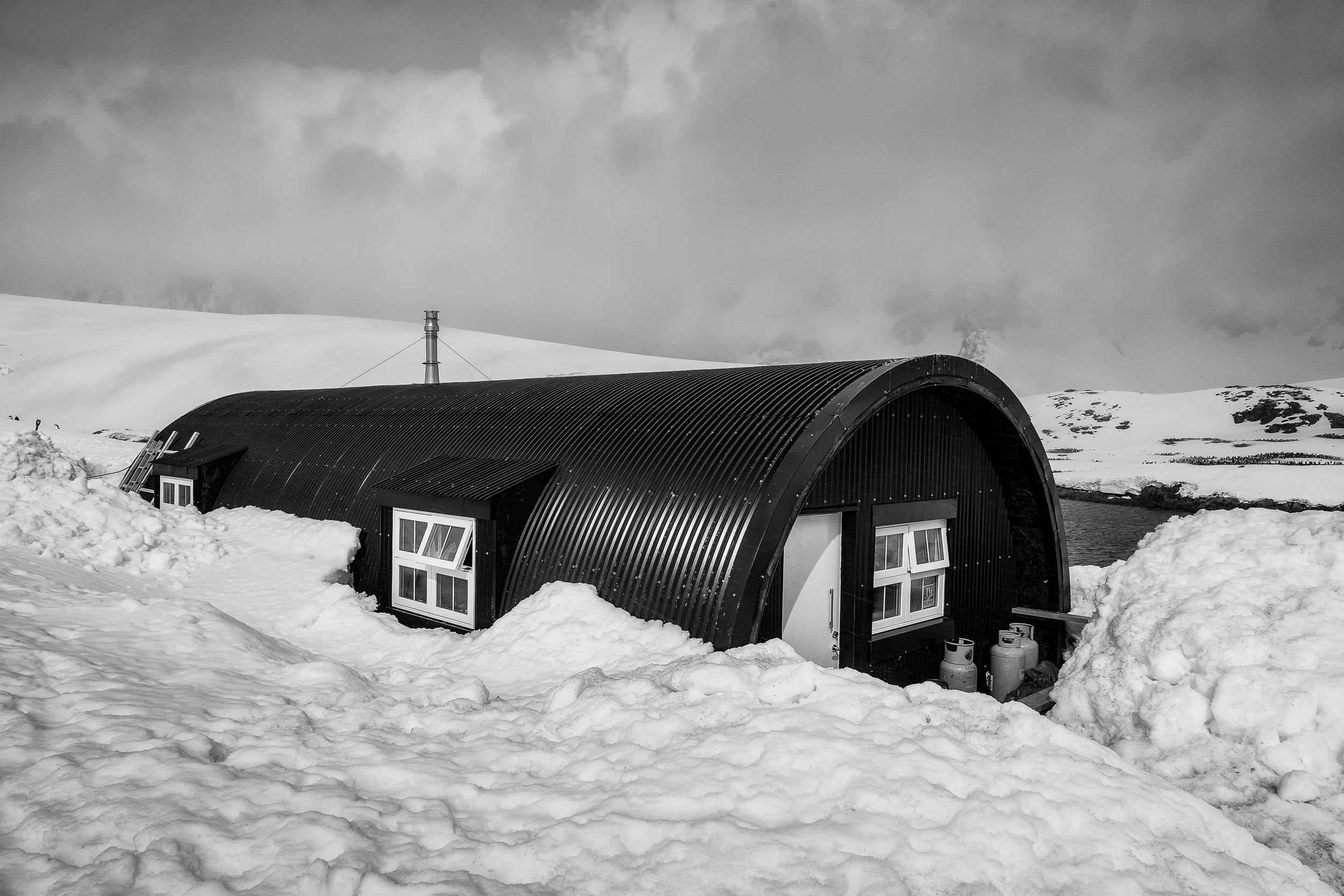 A shelter for the research scientists who live on site at Port Lockroy on Wiencke Island in Antarctica .