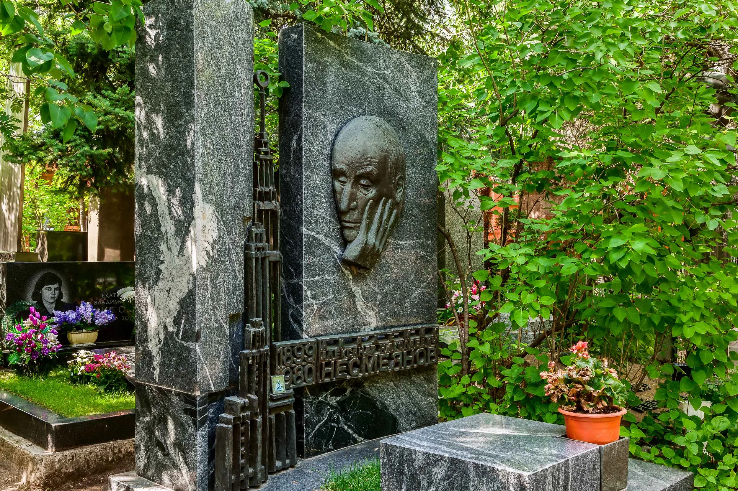 A peaceful scene of a beautiful gravestone in the grounds of Novodevichy Cemetery in Moscow, Russia .