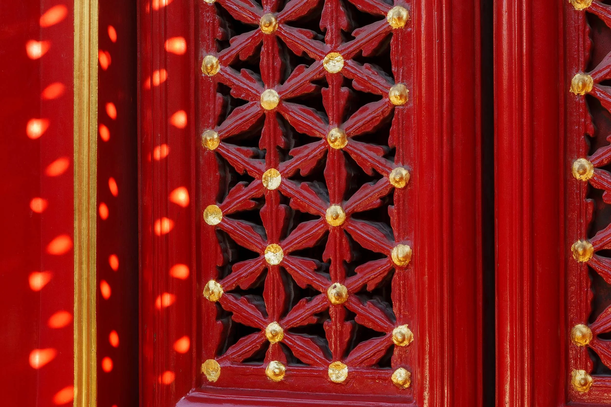 Photographing China will reveal many gifts to you like this image of light creating interesting shapes on a freshly painted window shutter in The Forbidden City in Beijing, China .