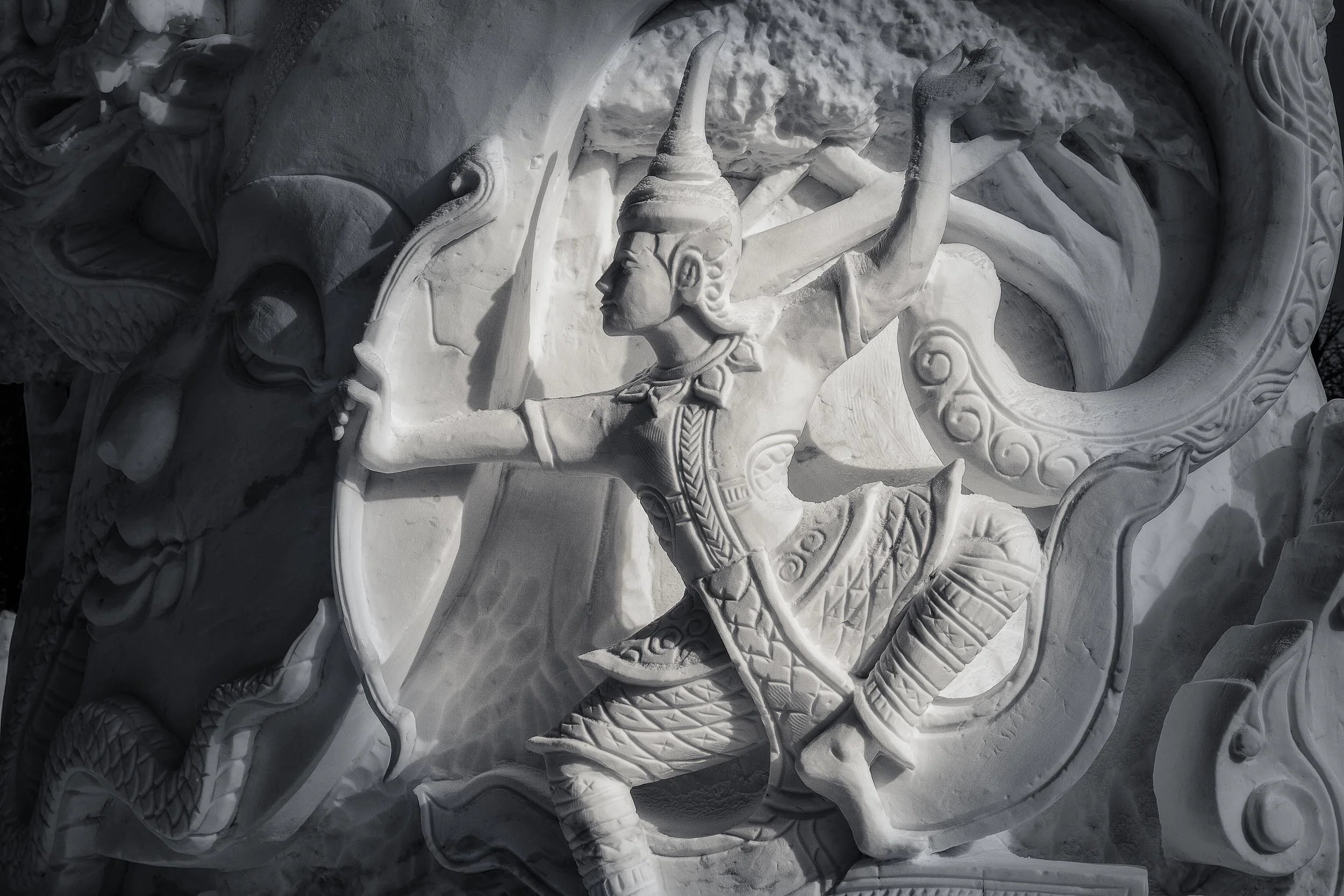 A Thai warrior , carved in snow at Snow World in Harbin, China .
