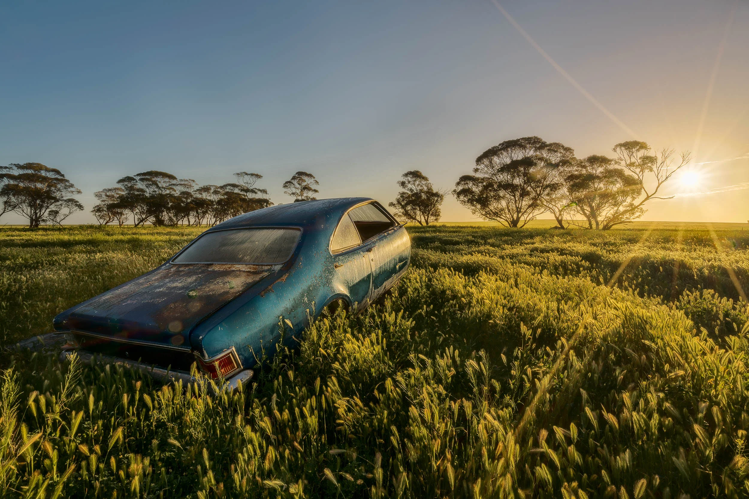 Remains of an old car, at sunrise, in the Mallee, Australia.