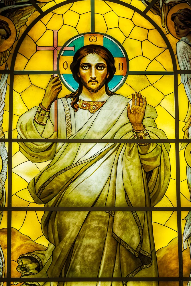 A spectacular image of Jesus in a stained glass window at Peter and Paul Cathedral in St. Petersburg, Russia .