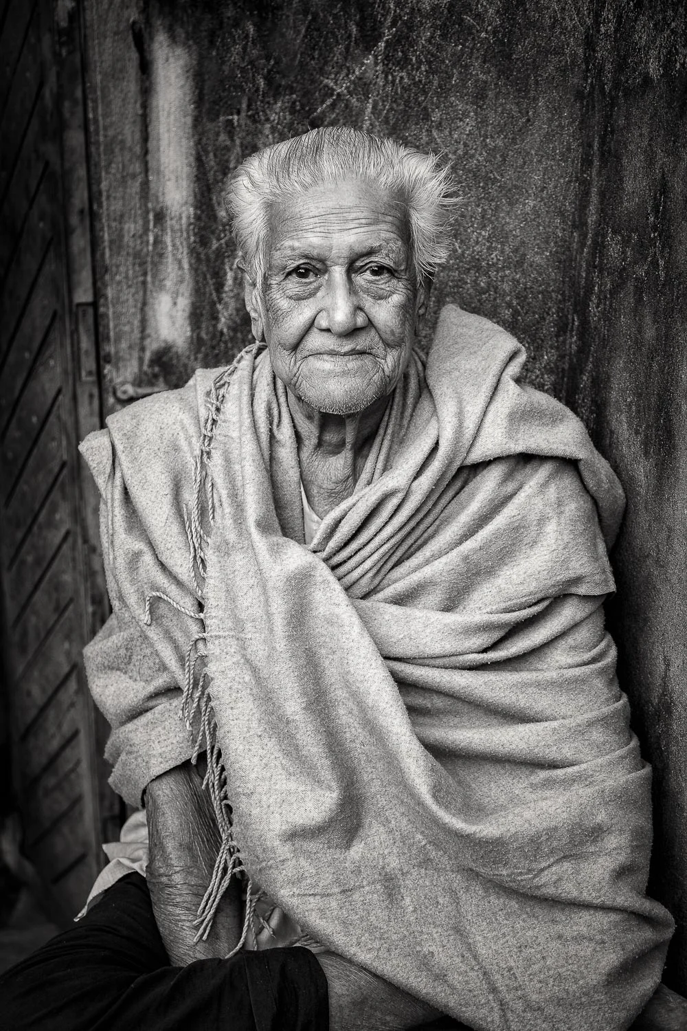 A dignified black and white portrait of a gentle soul in Kolkata, India .