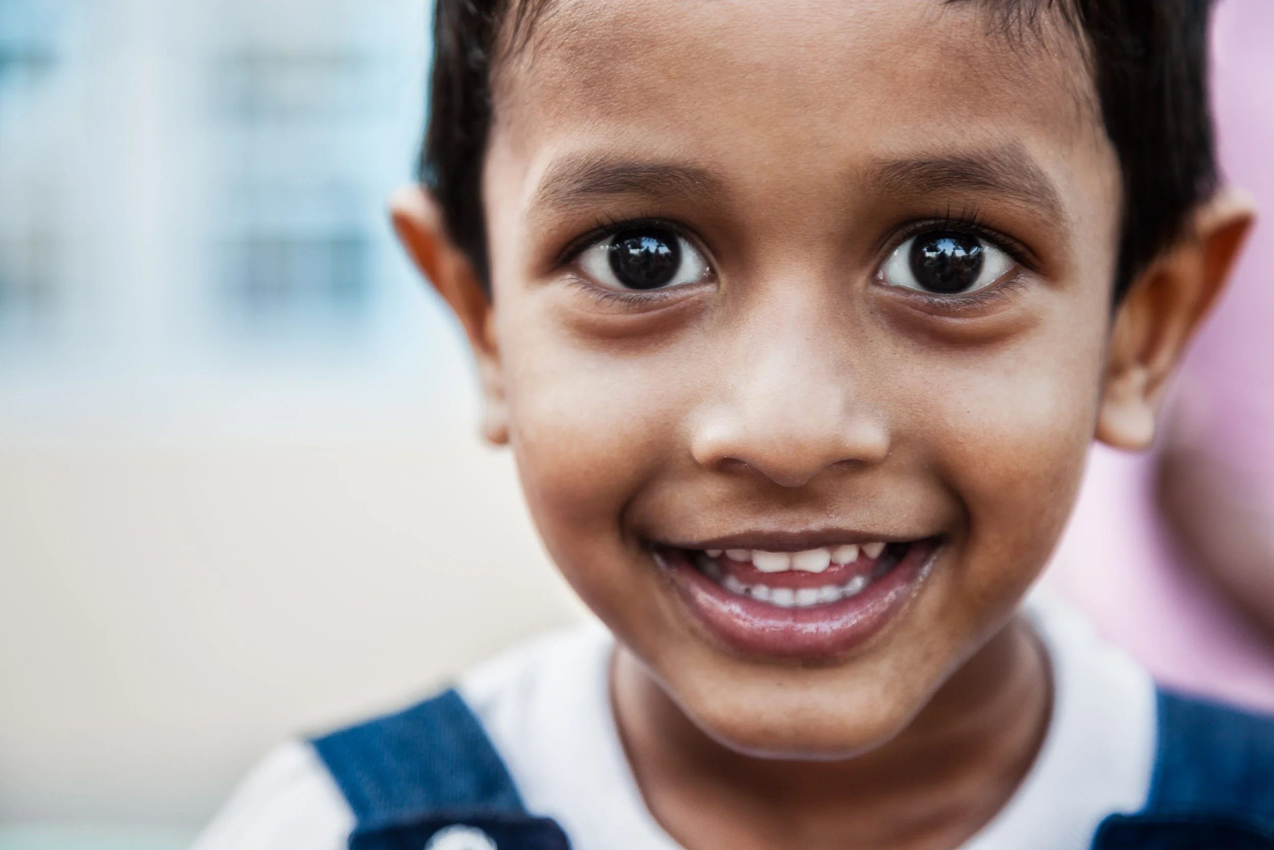 An expression of interest is alive in the eyes of this young boy on the outskirts of Chennai in Tamil Nadu, India .