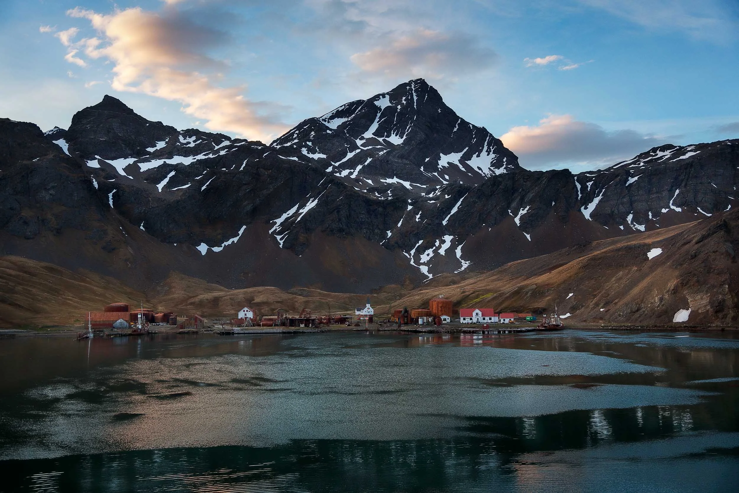 Overview of the Grytviken Whaling Station set amongst spectacular mountain scenery on South Georgia Island .