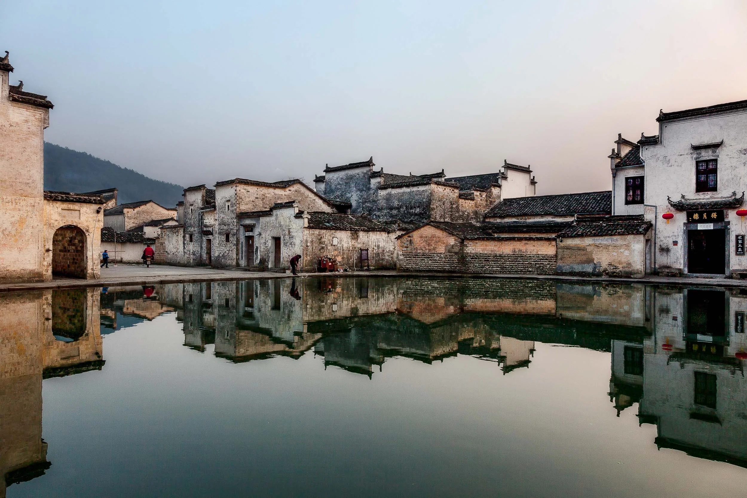 Buildings reflected in a pond in Hongcun Village, Anhui Province, China.