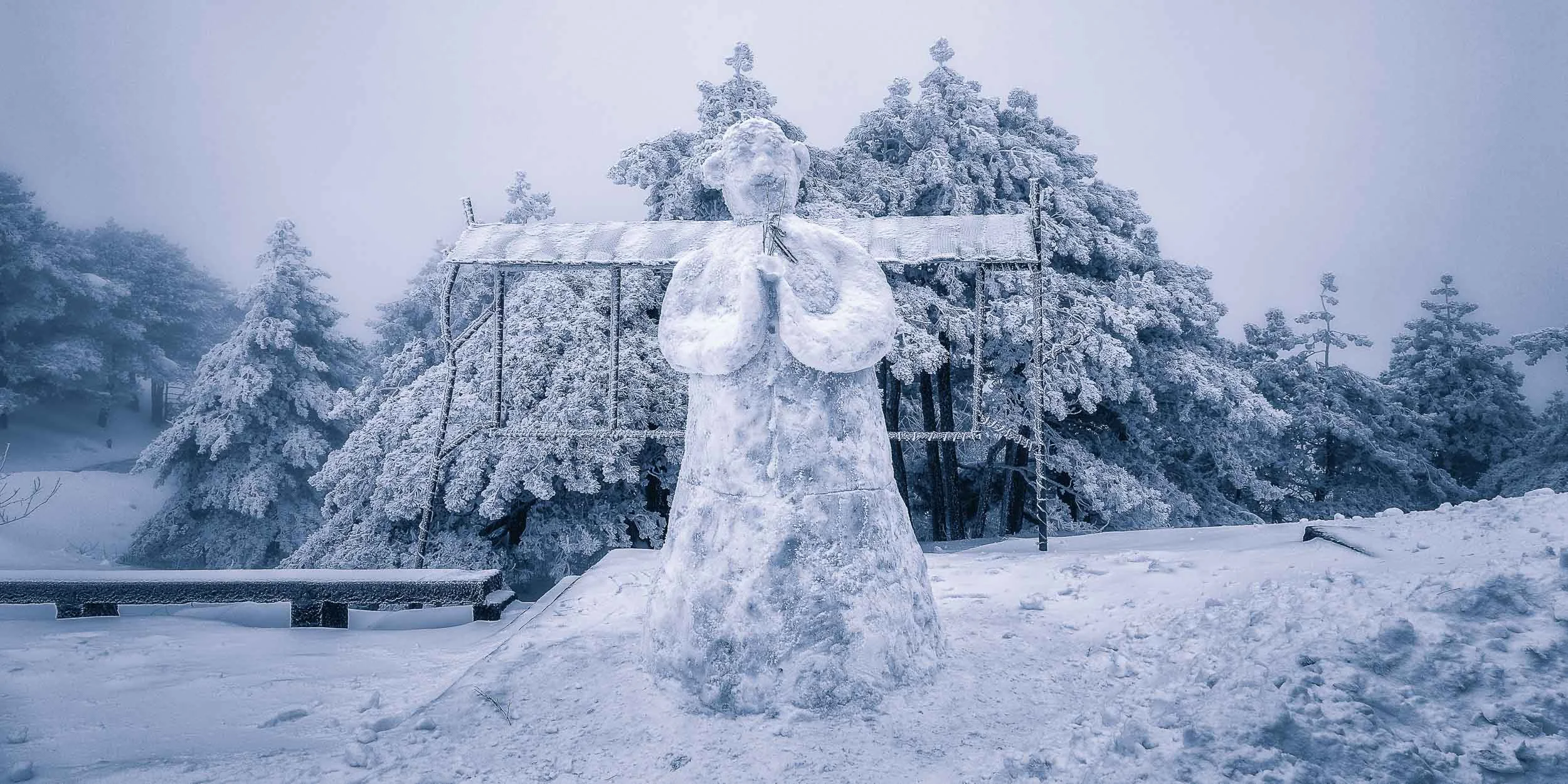Snowman greets visitors on Huangshan (i.e., Yellow Mountain) in Eastern China.