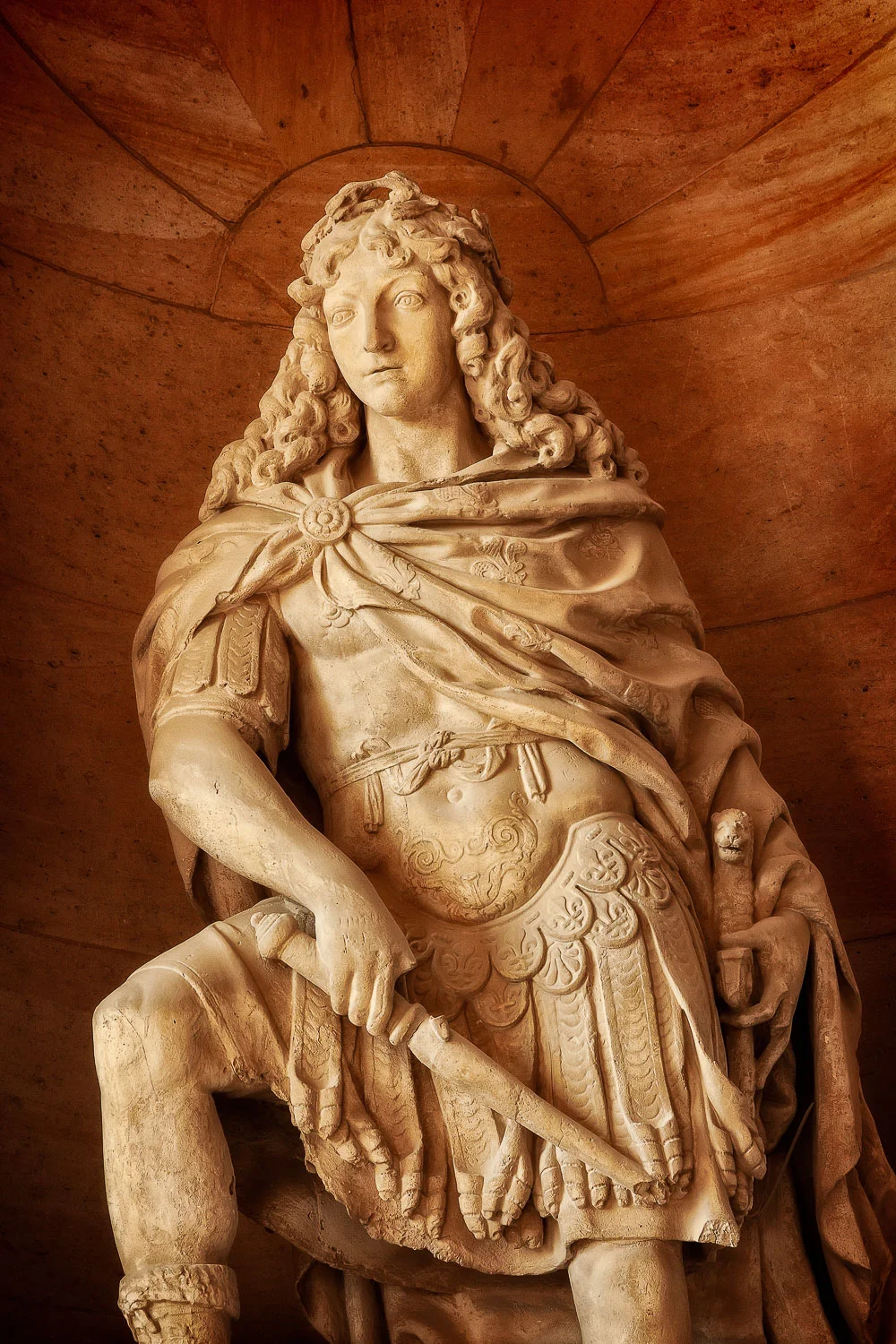 Statue depicting King Louis XIV, the Sun King, Palace of Versailles, France.