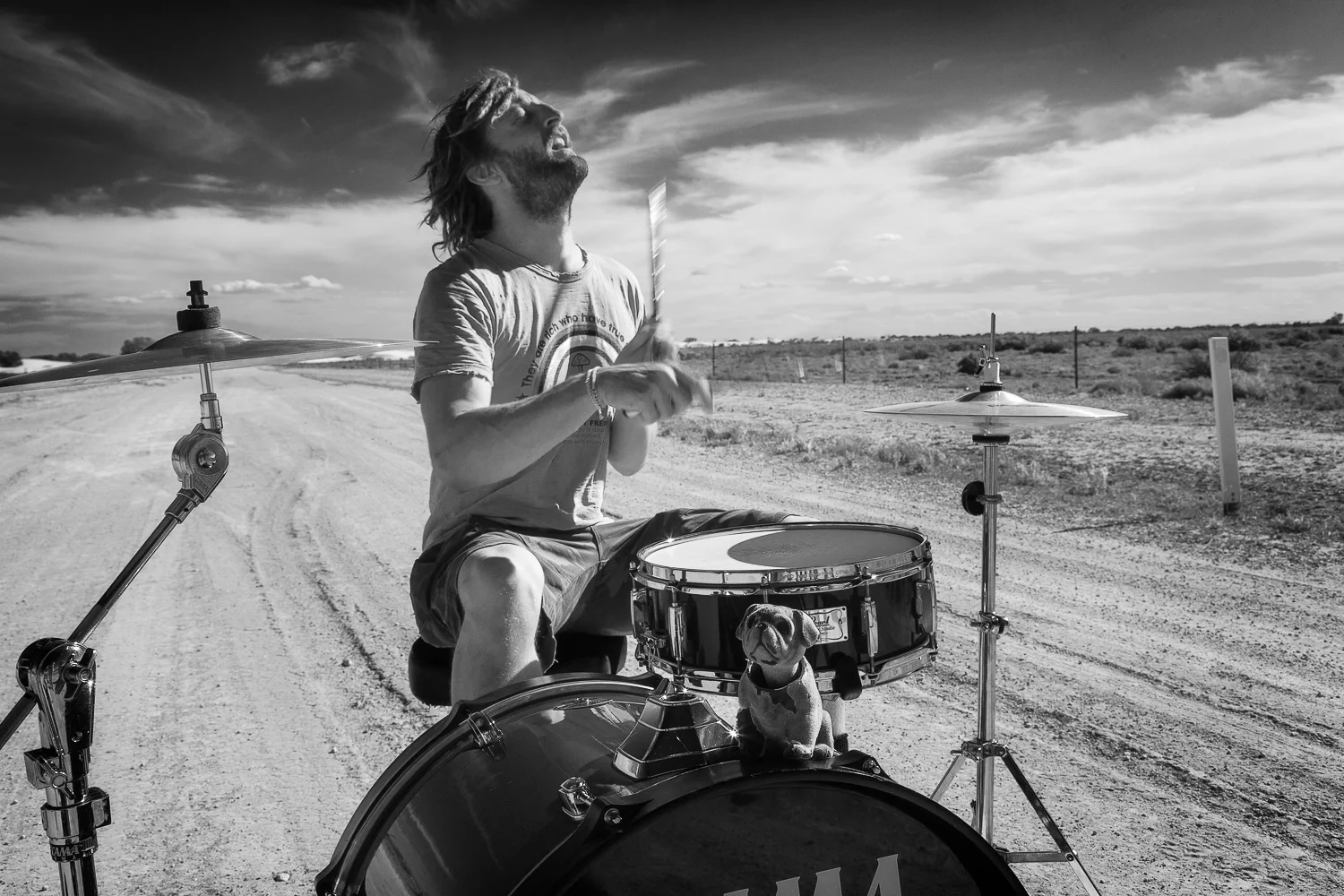 Drummer playing in the middle of nowhere. Link to Travel Resources page.