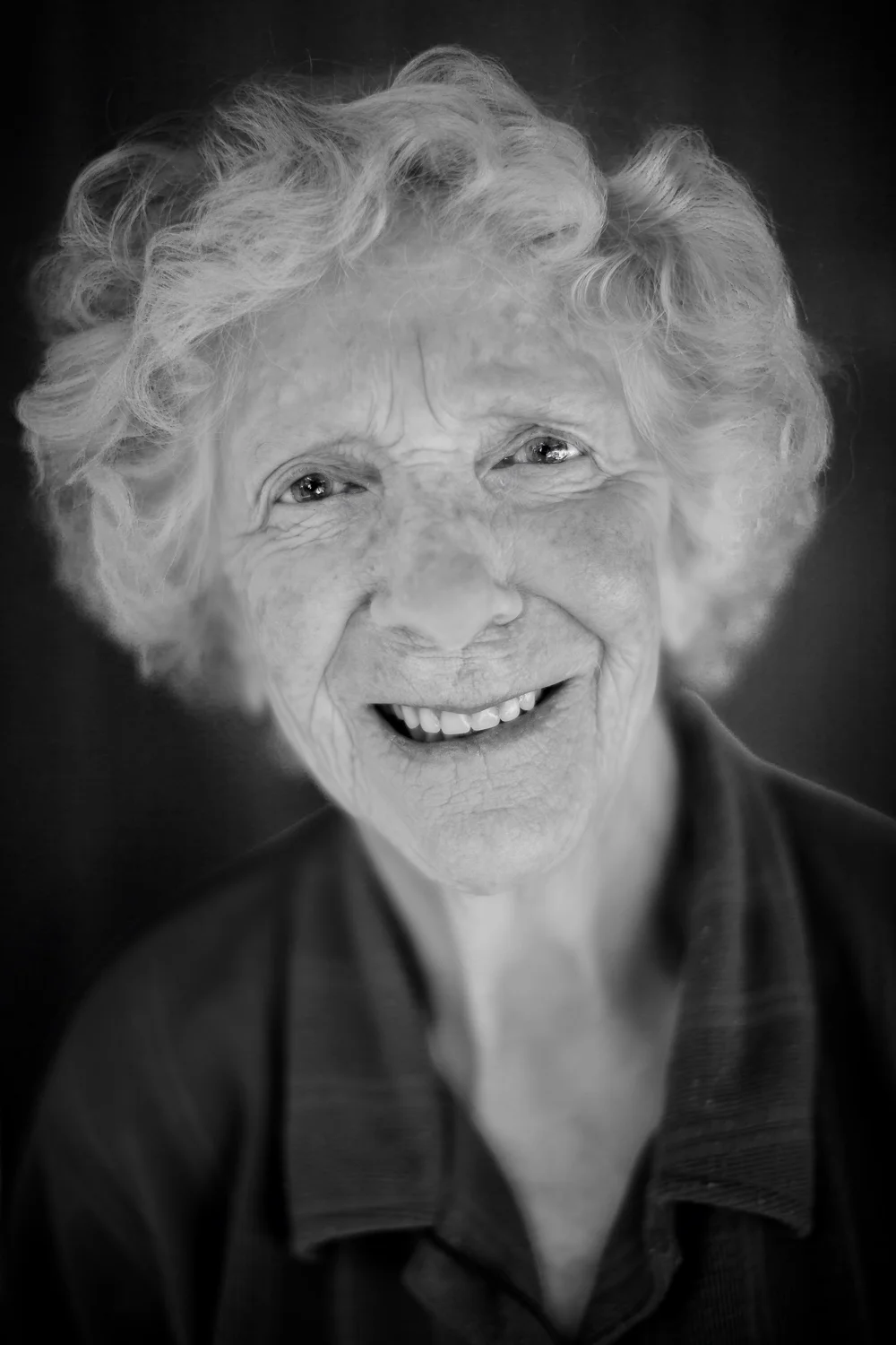 A black and white photo of my mother, Mary Guy (OAM), at home in Hamilton, Australia.