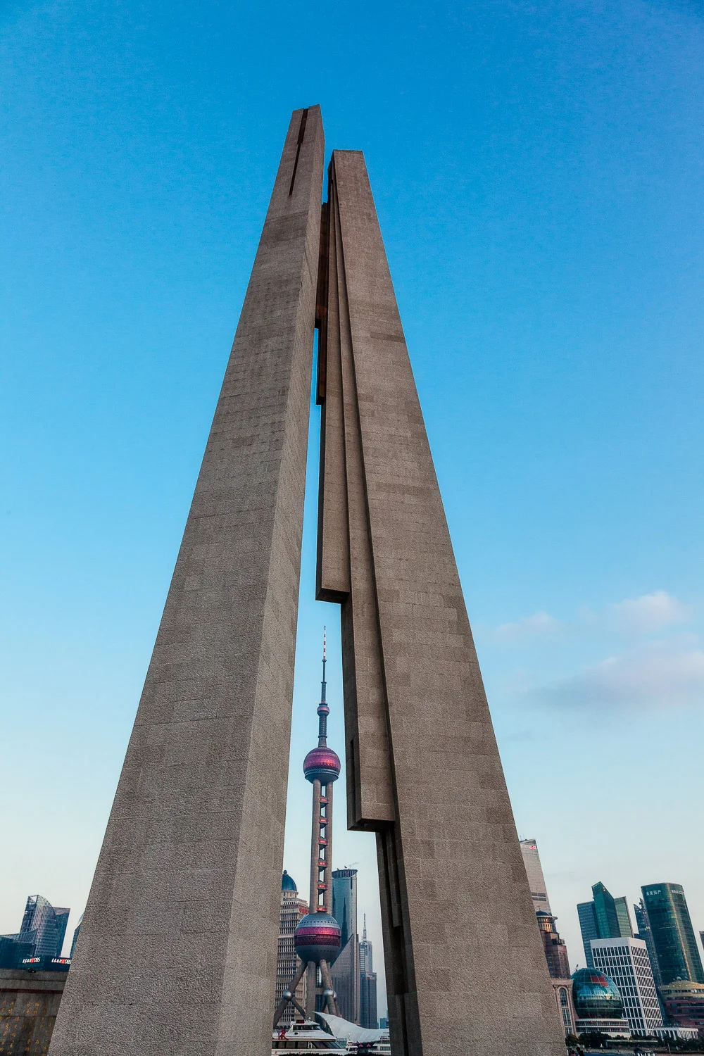 Oriental Pearl Tower framed by the Shanghai People's Heroes Memorial Tower.