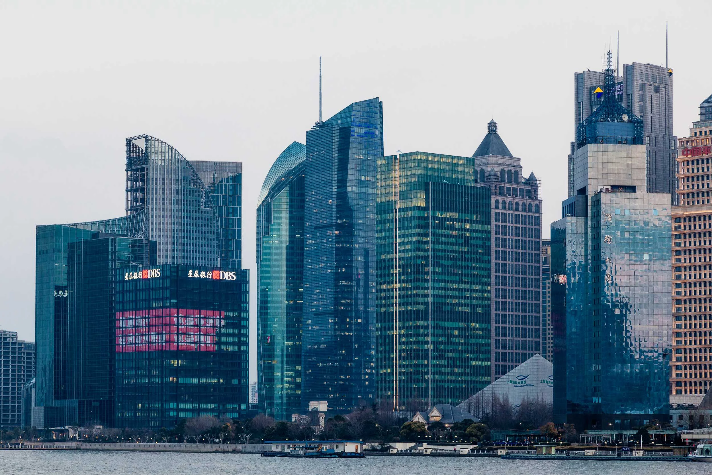 Pudong skyline in Shanghai, illuminated by the gentle light of dusk.