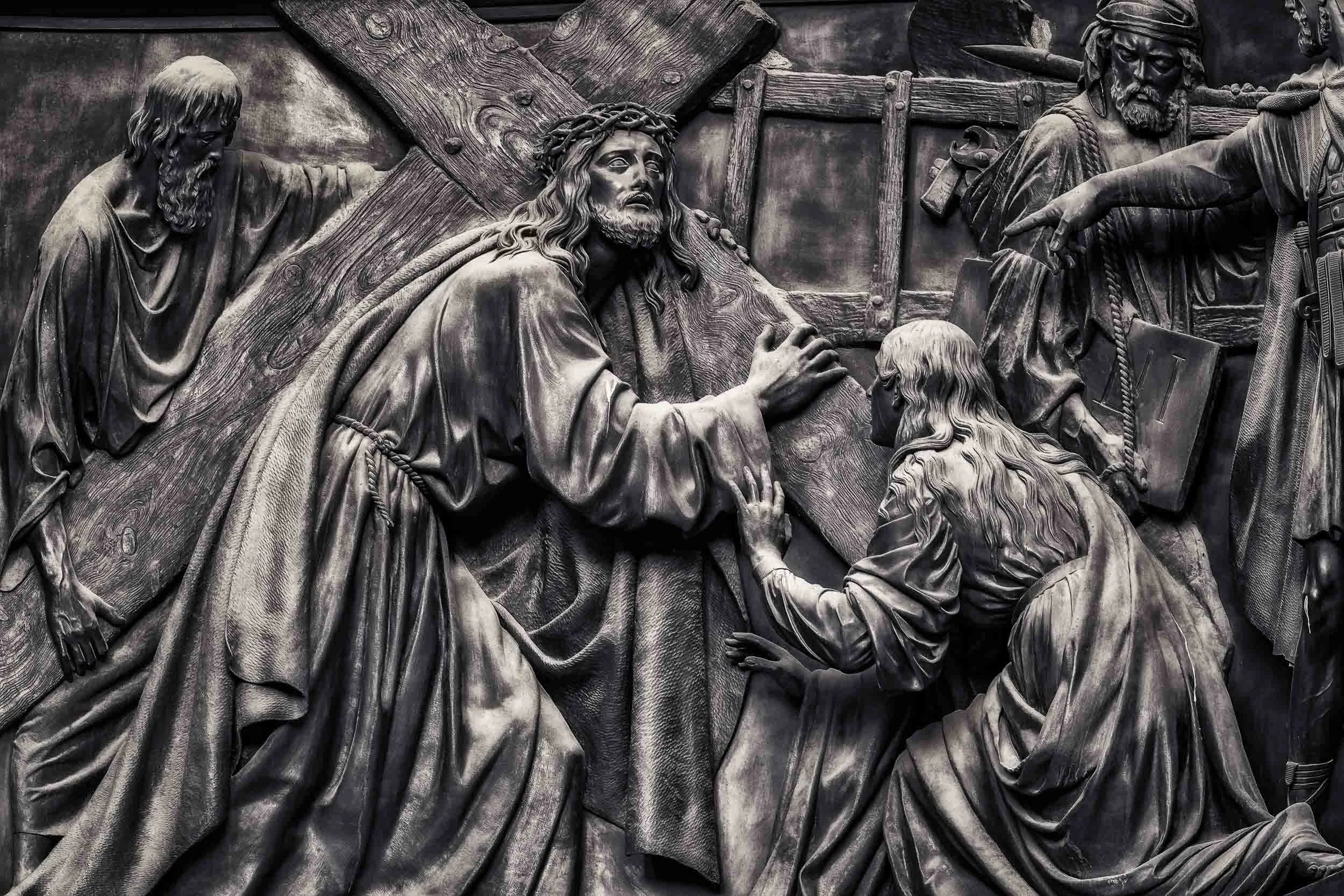 Stunning relief of the road to Calvary on an outside wall of the magnificent St. Isaac's Cathedral in St. Petersburg, Russia .
