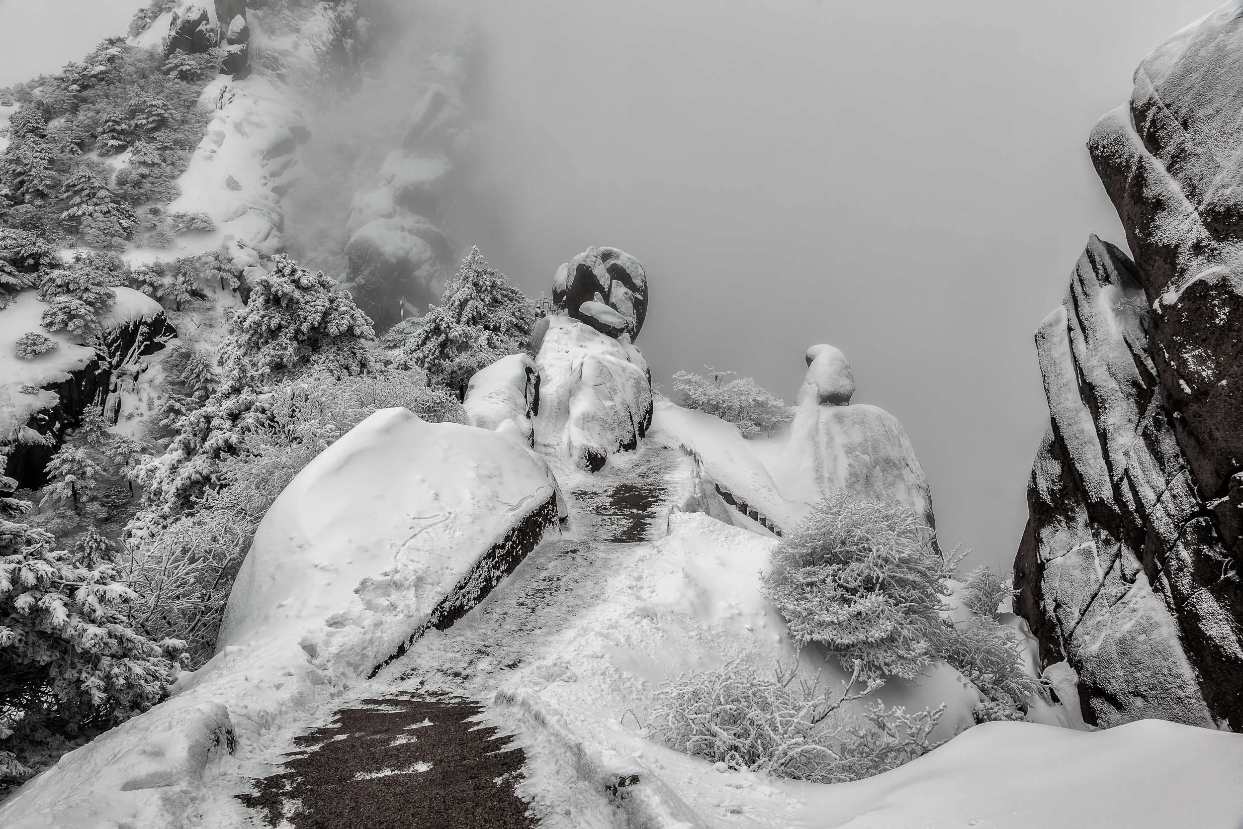 The road ahead is not always clear or easy. But all journey's starts with a single step, and each subsequent step shortens the journey and immerses you further in the adventure. Into the mist - my road ahead on Huangshan, China .
