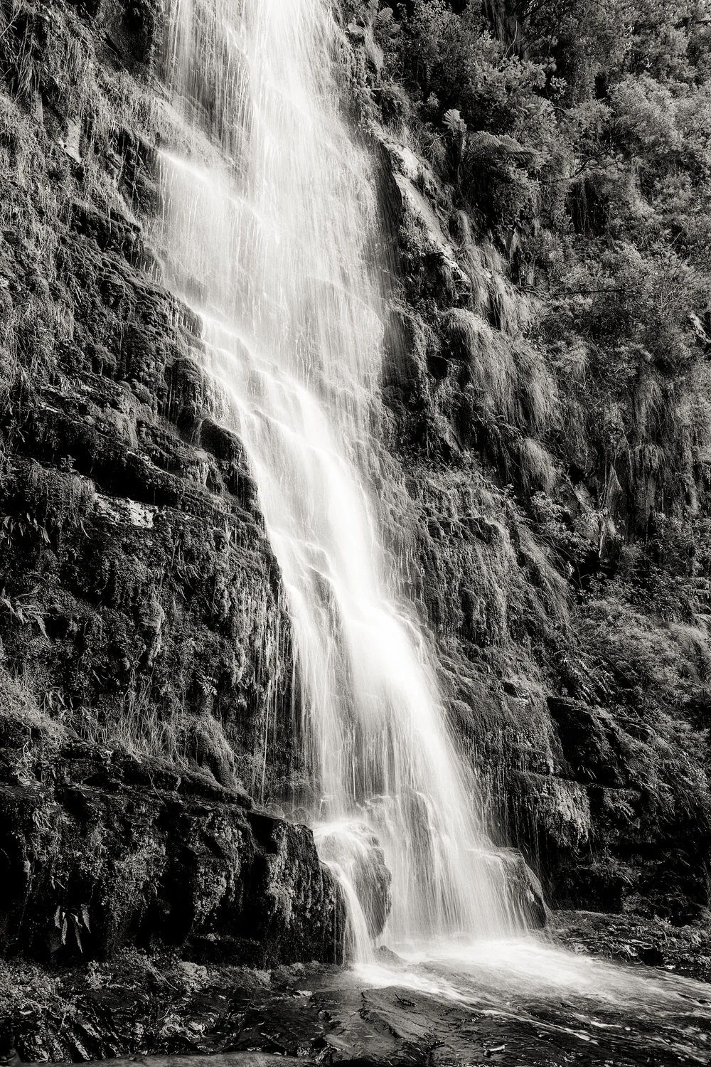 Water cascades down Erskine Falls near the town of Lorne in the Great Otway National Park , Australia.